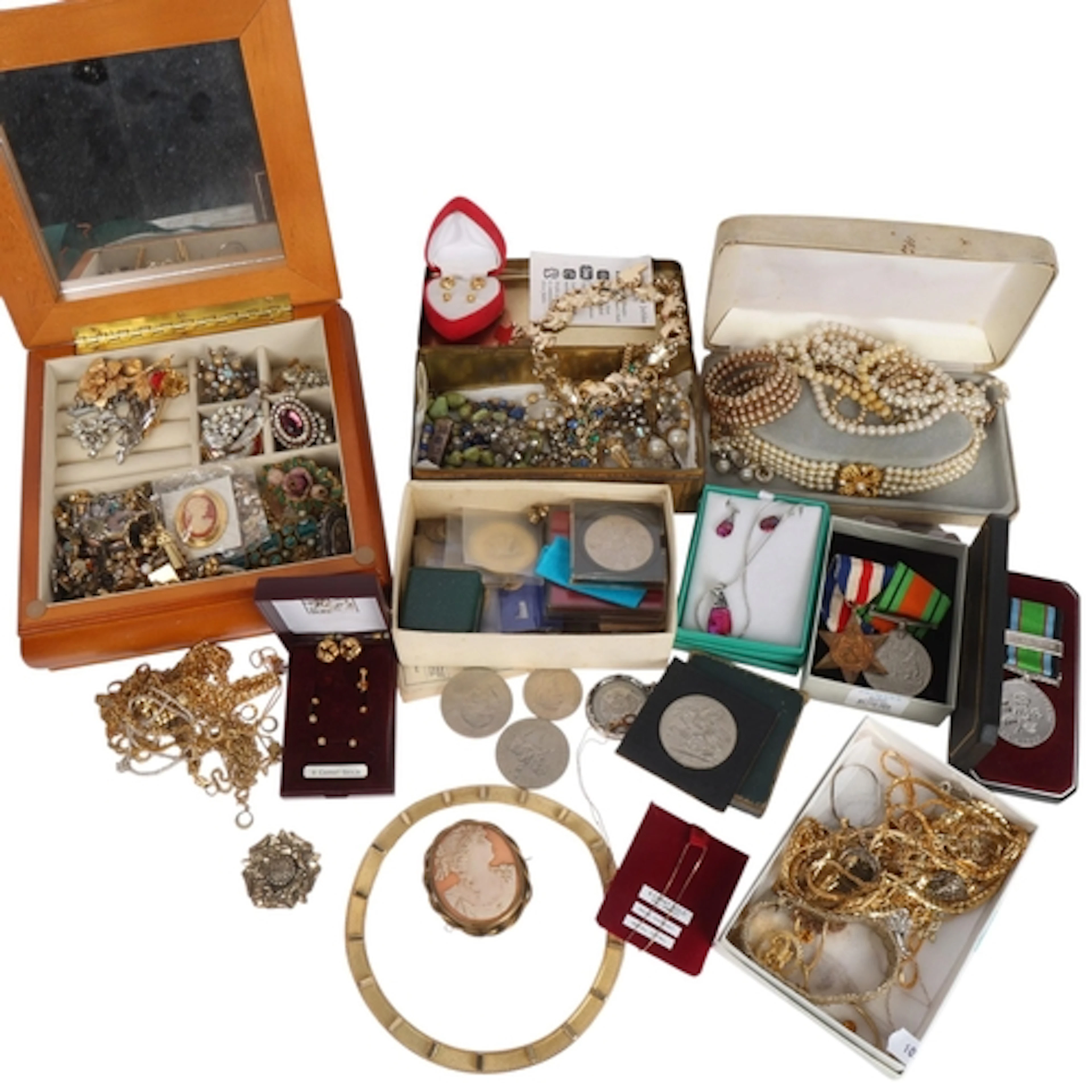 A large quantity of silver and costume jewellery, including ...
