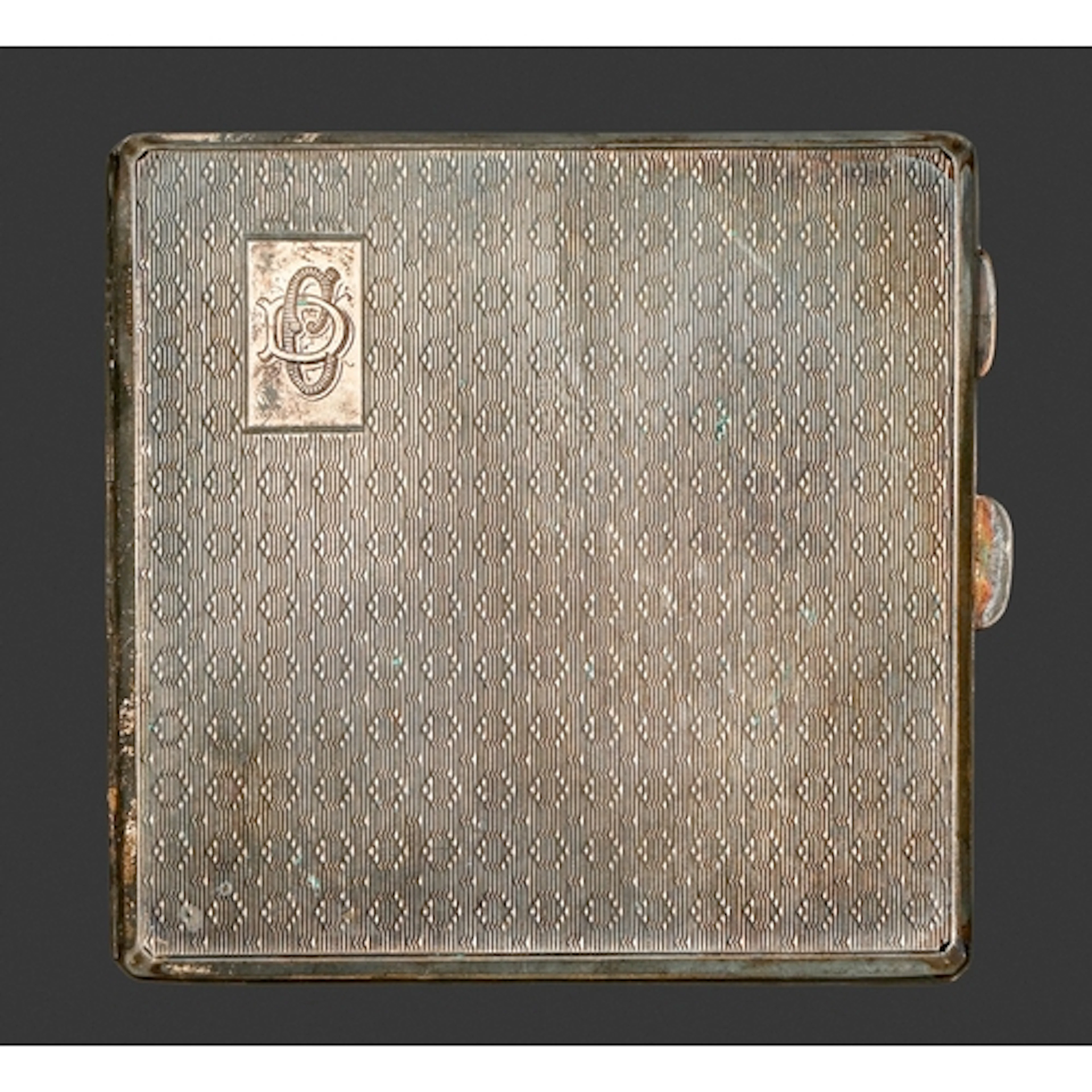 A George V silver cigarette case, engine turned, 8 x 8cm, by...
