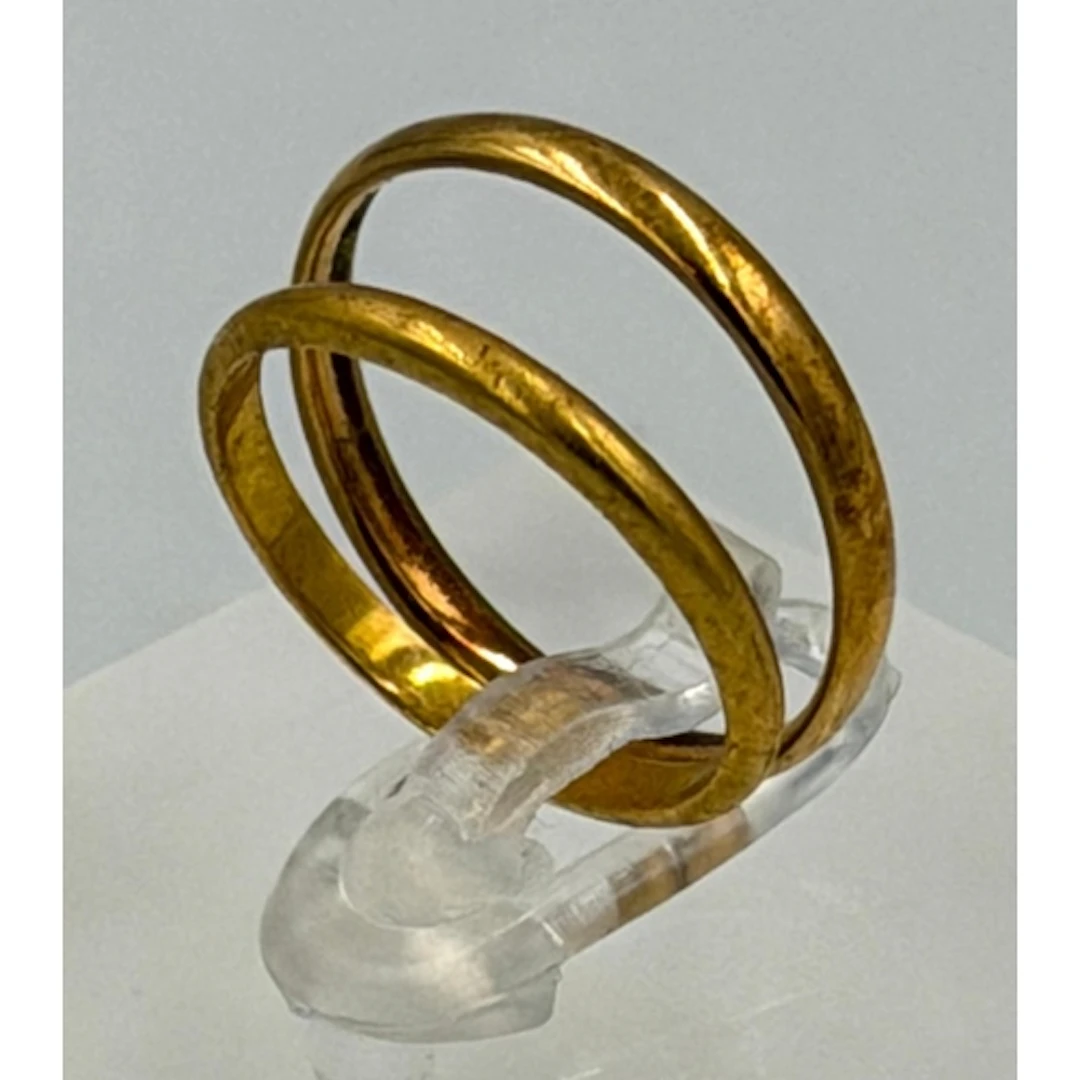 Two 22ct gold wedding bands with a combined approximate weig...