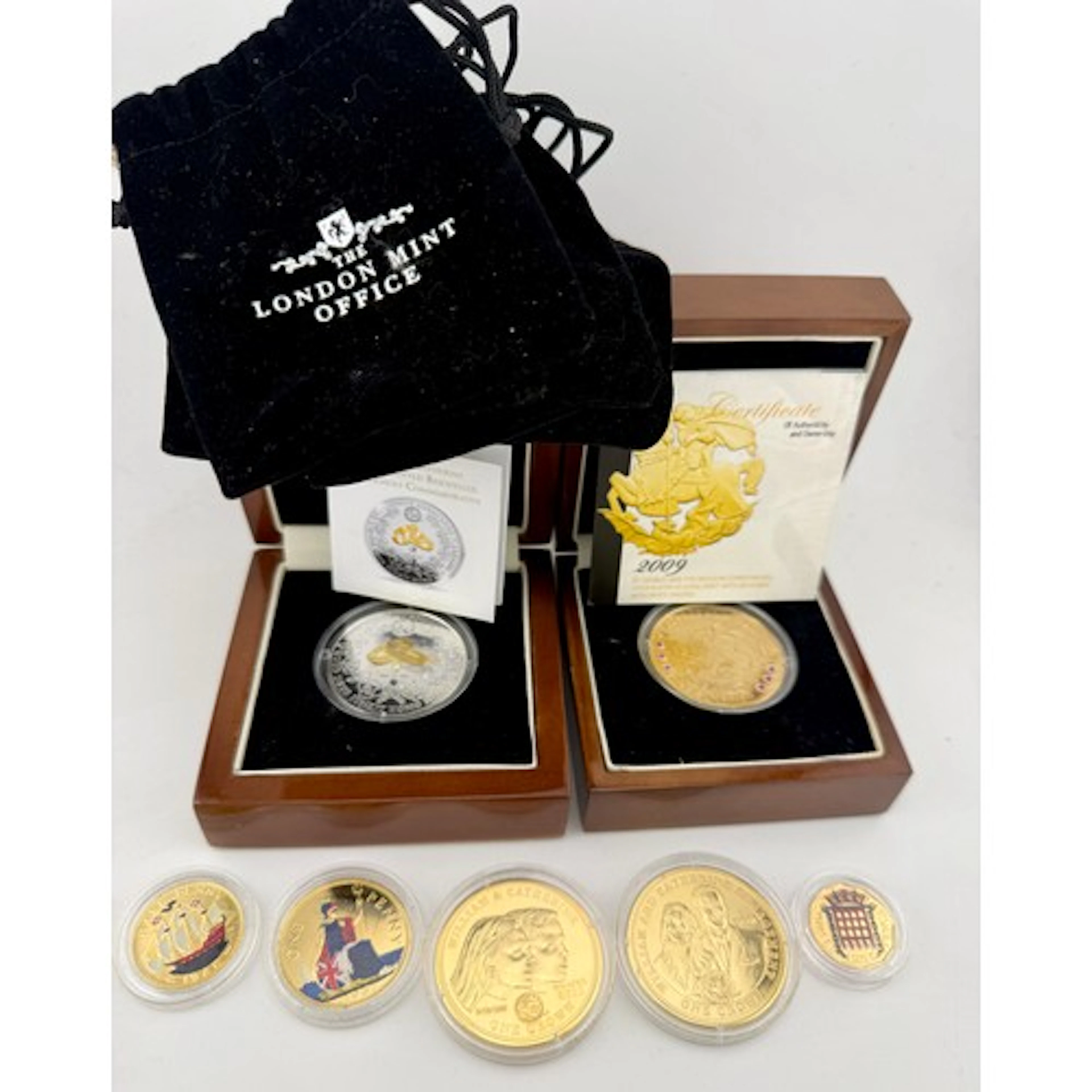 Commemorative coins from The London Mint Office to include W...