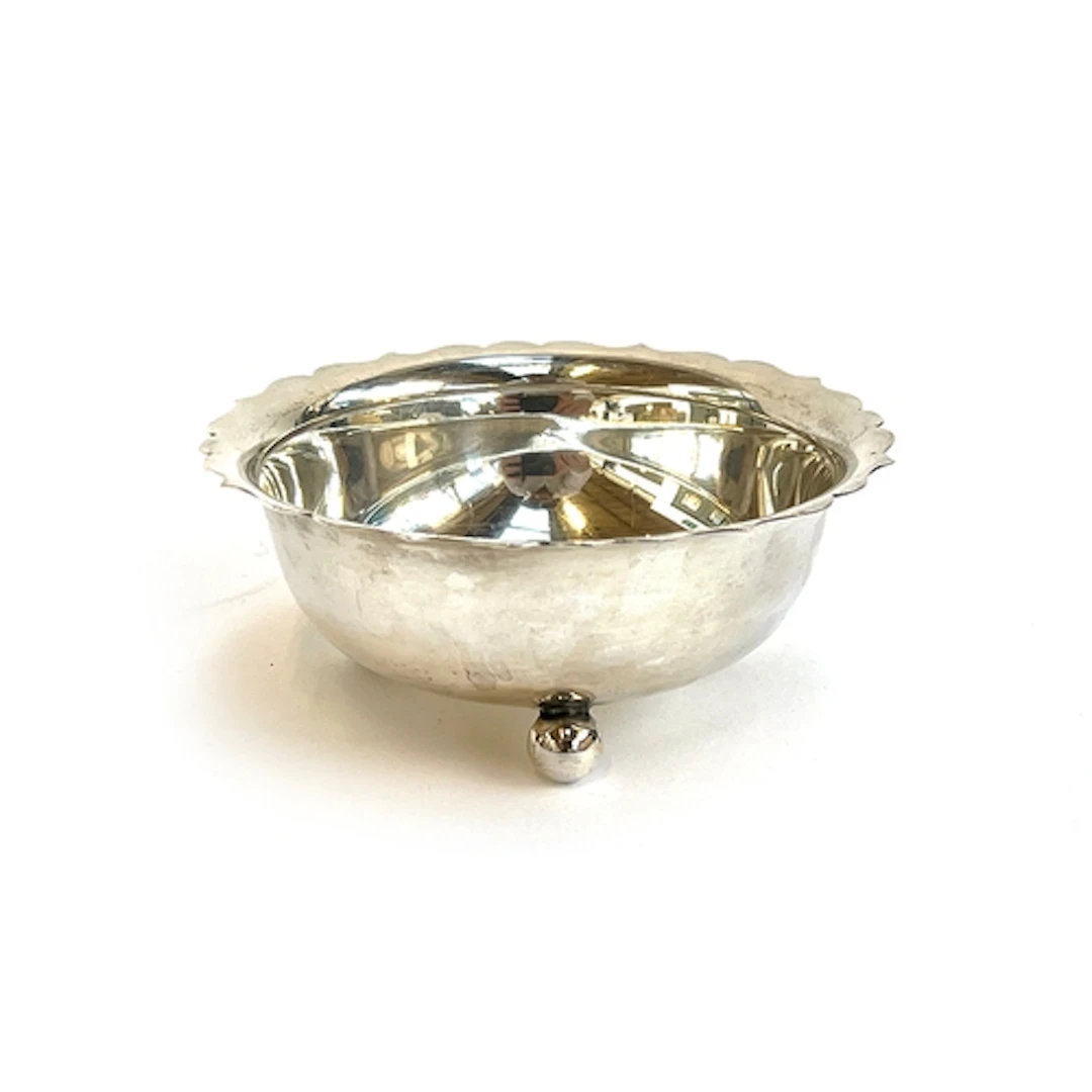 A silver bowl by Roberts & Belk, Sheffield, with shaped edge...