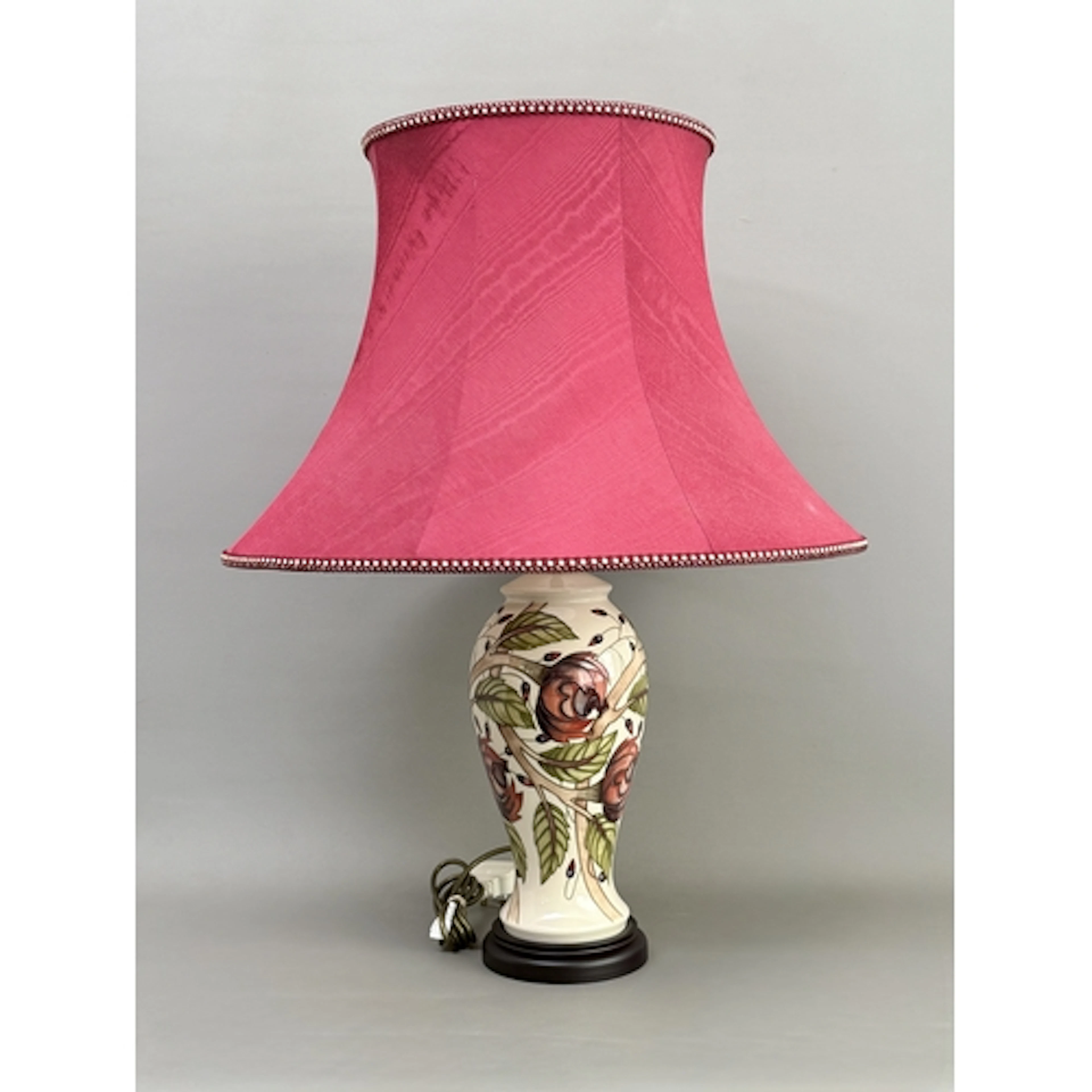 A Moorcroft pottery 'Pirouette Breeze' pattern table lamp, d...