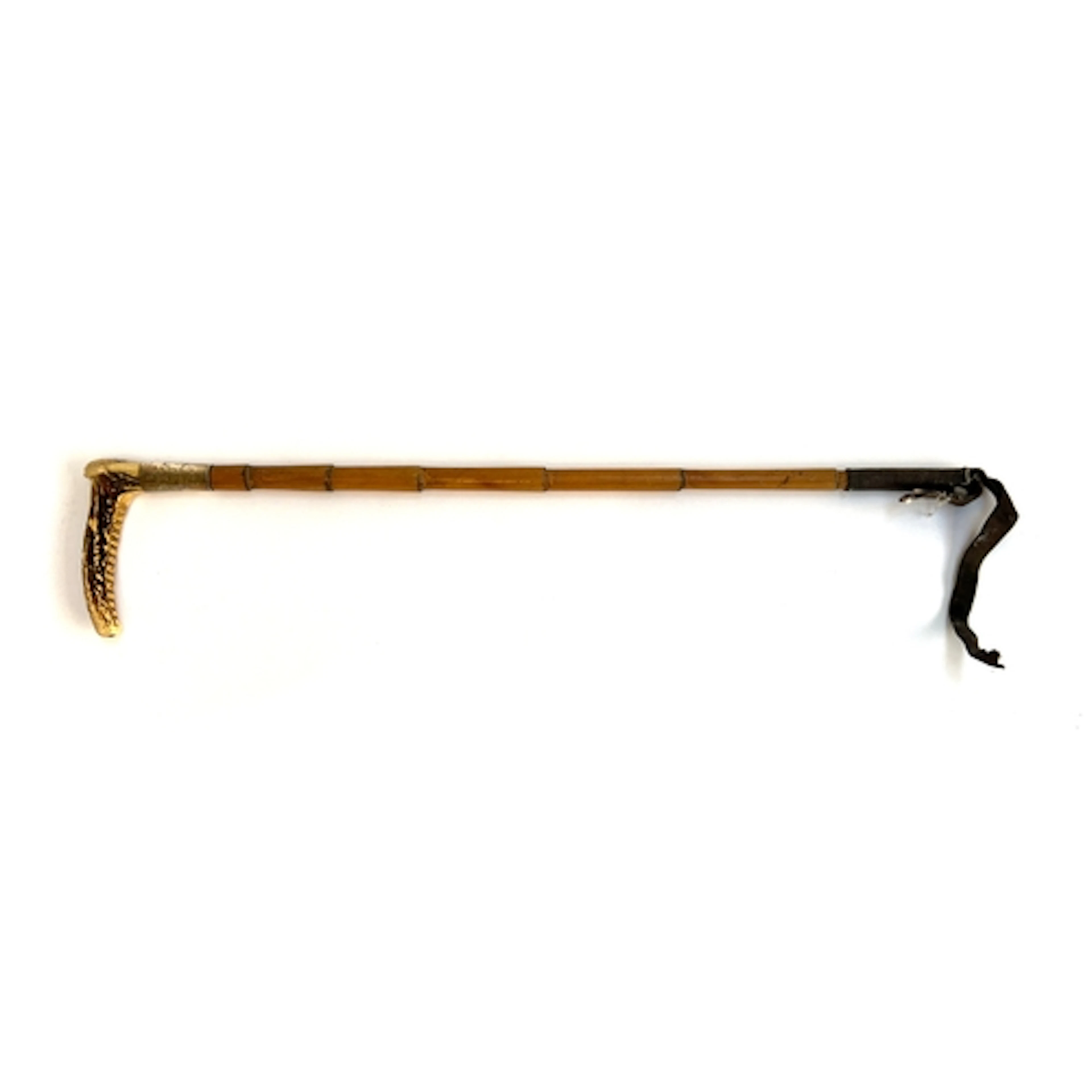 A Victorian bamboo hunting whip with antler handle and silve...