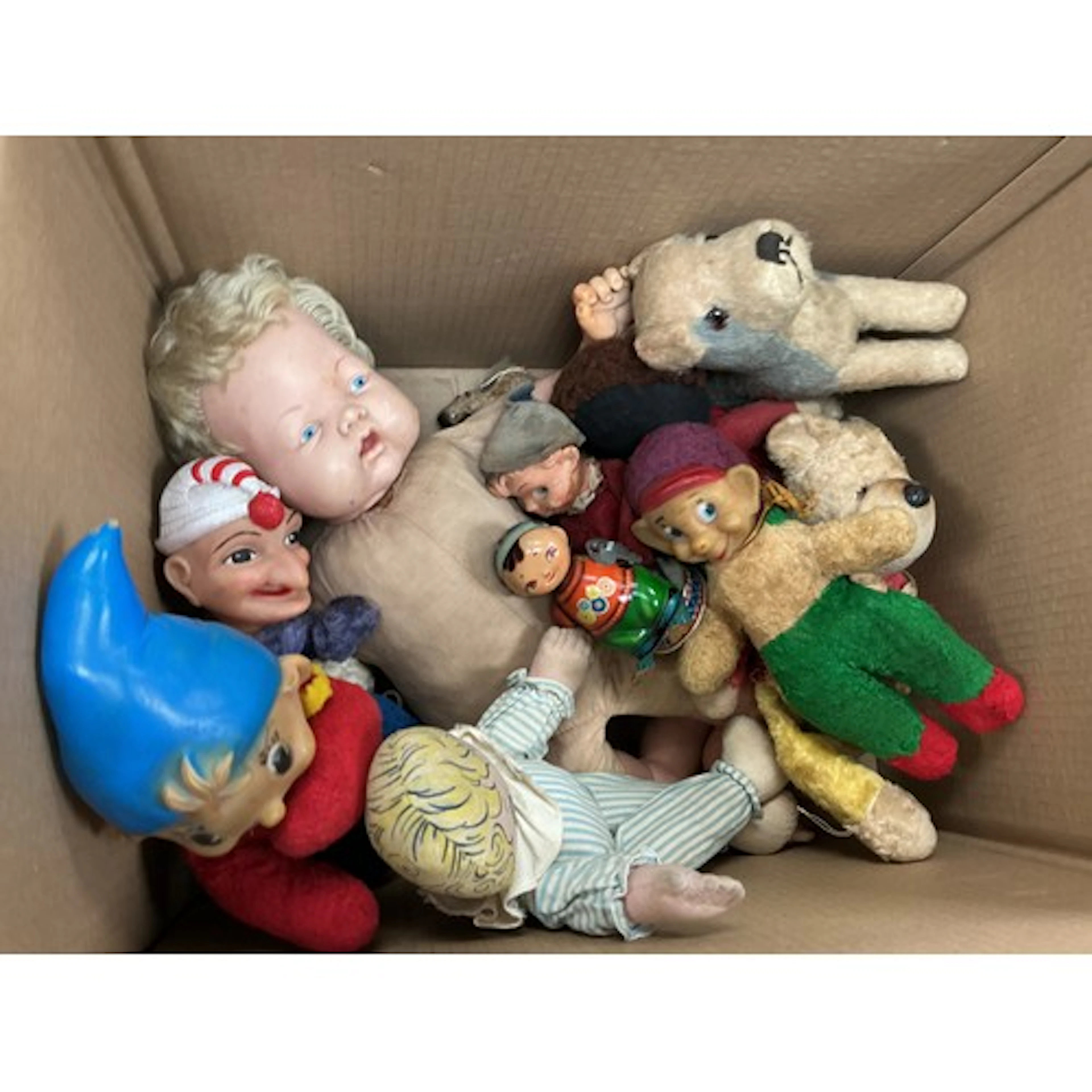 A box of vintage teddy bears, tin plate toys etc.