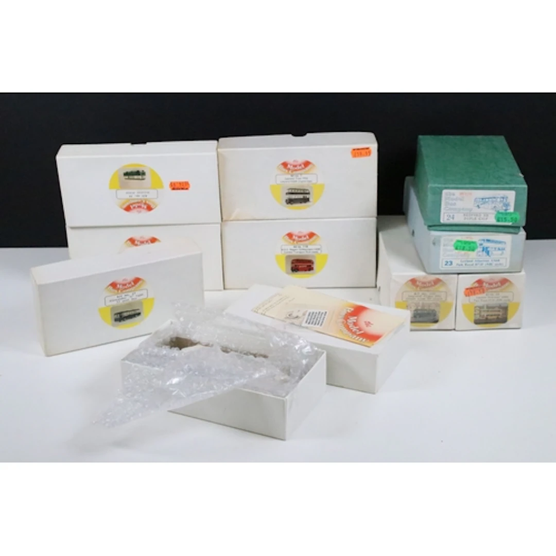 Ten boxed The Model Bus Company white metal model bus and co...