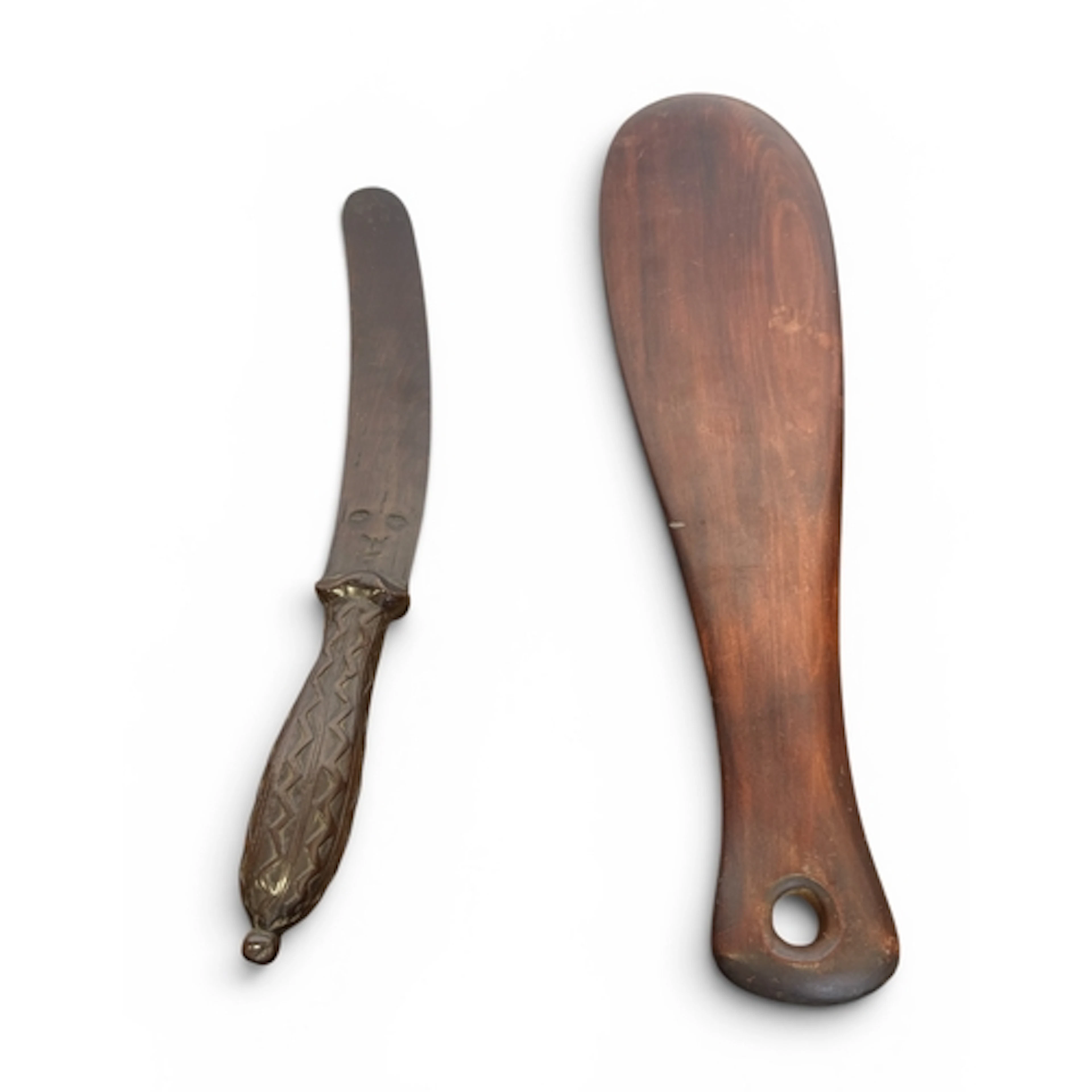 A MAORI CLUB TOGETHER WITH A FIJIAN PAPER KNIFE