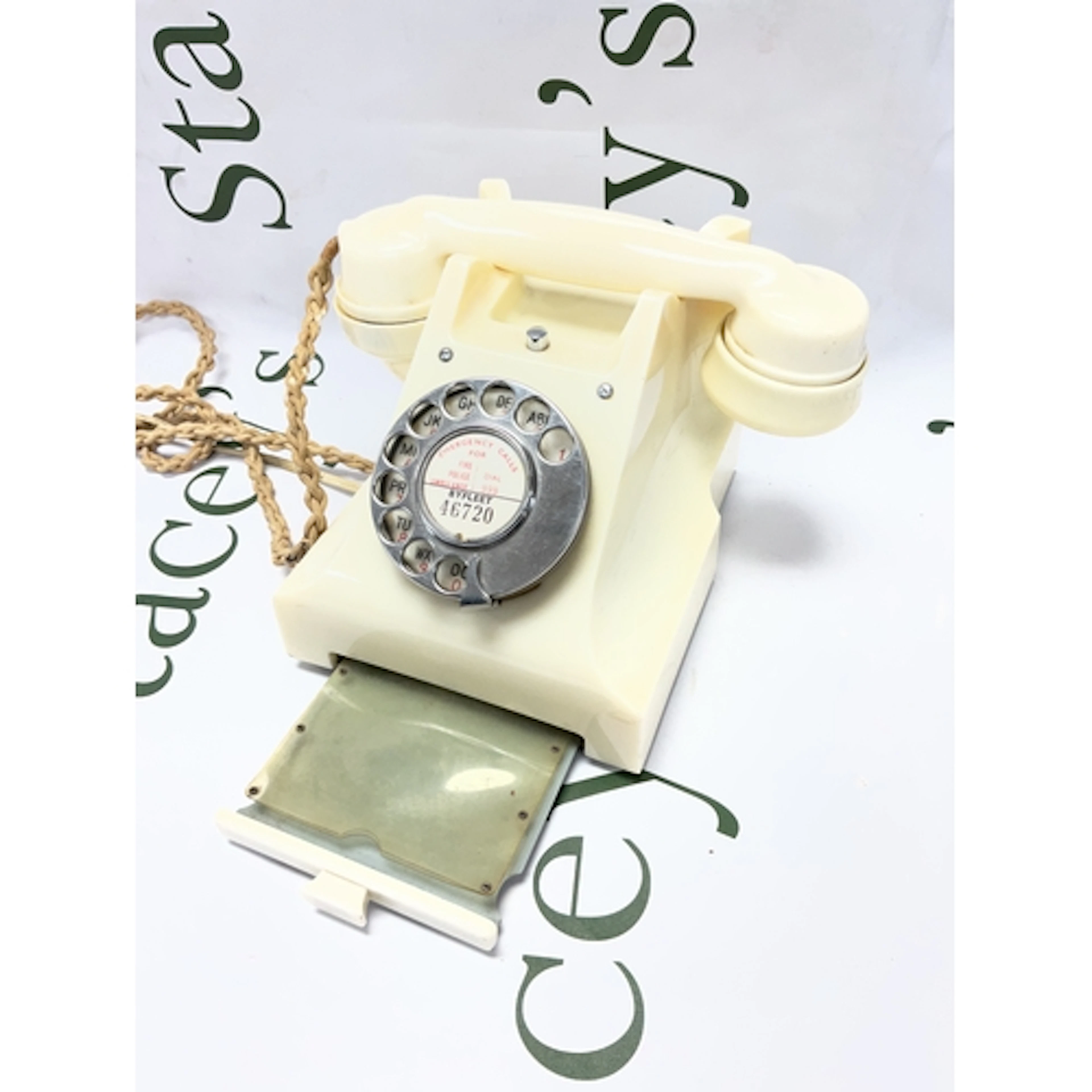 Vintage Ivory phone with drawer.