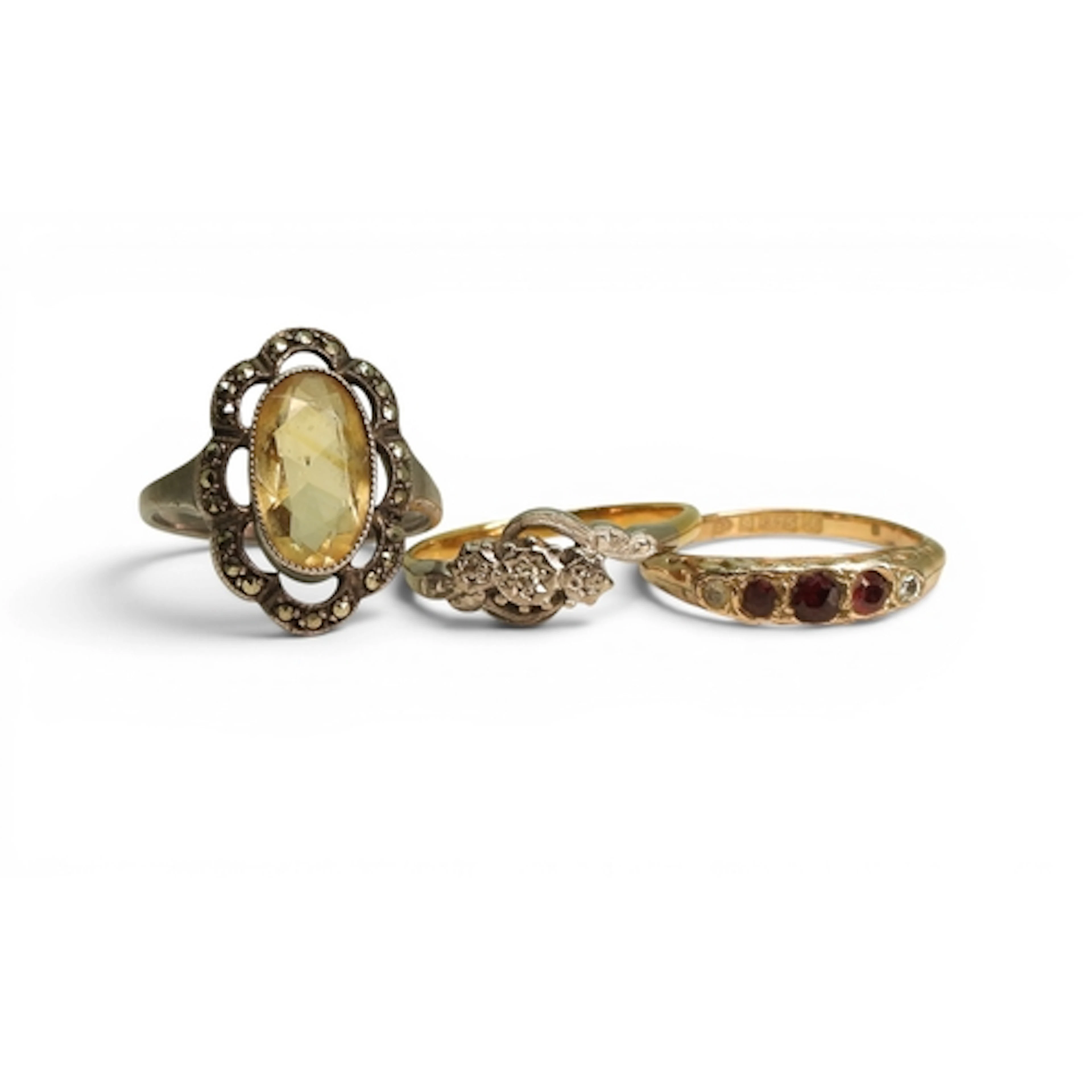 A yellow and white metal three stone illusion set vintage ri...
