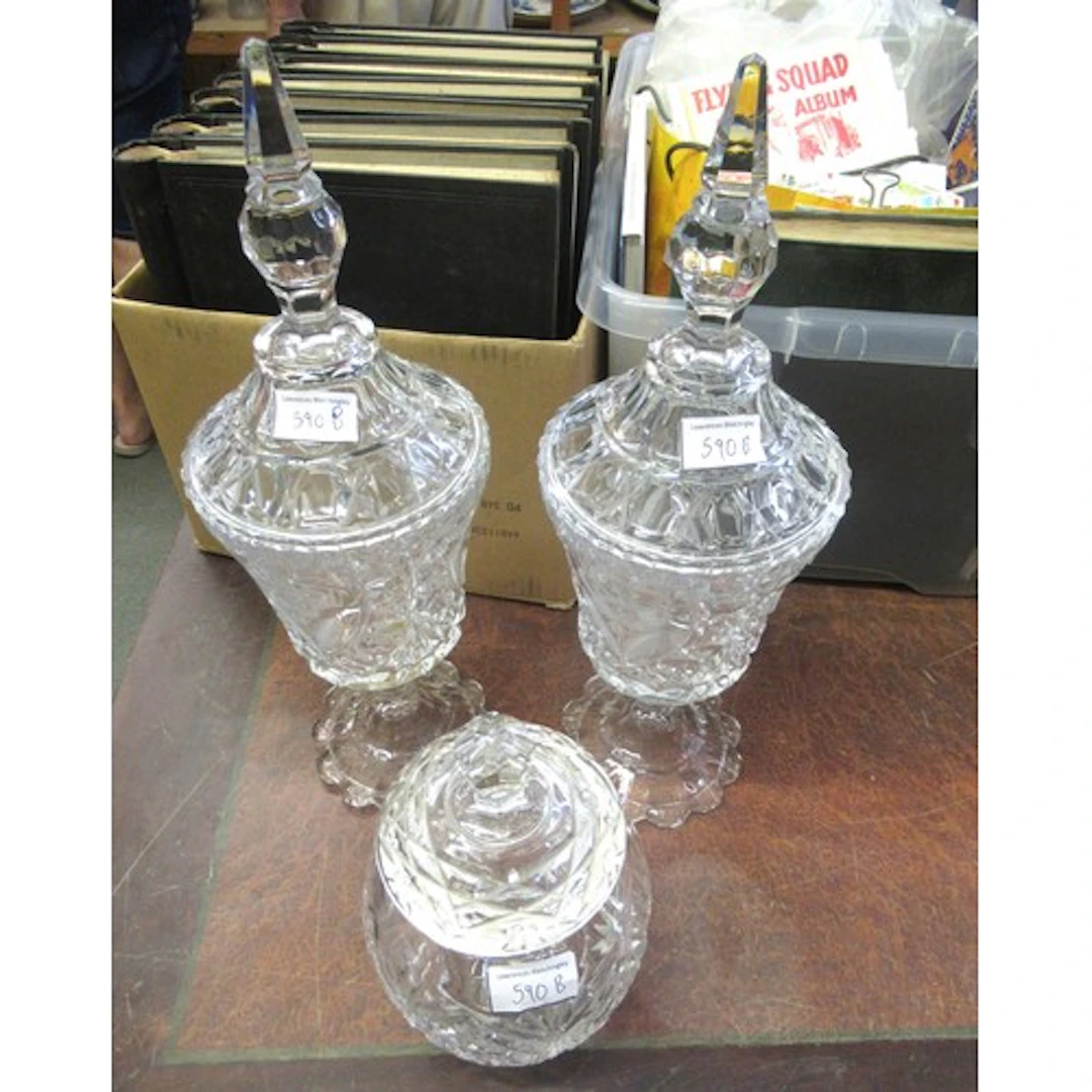 Pair of cut glass vases with covers, together with a cut gla...