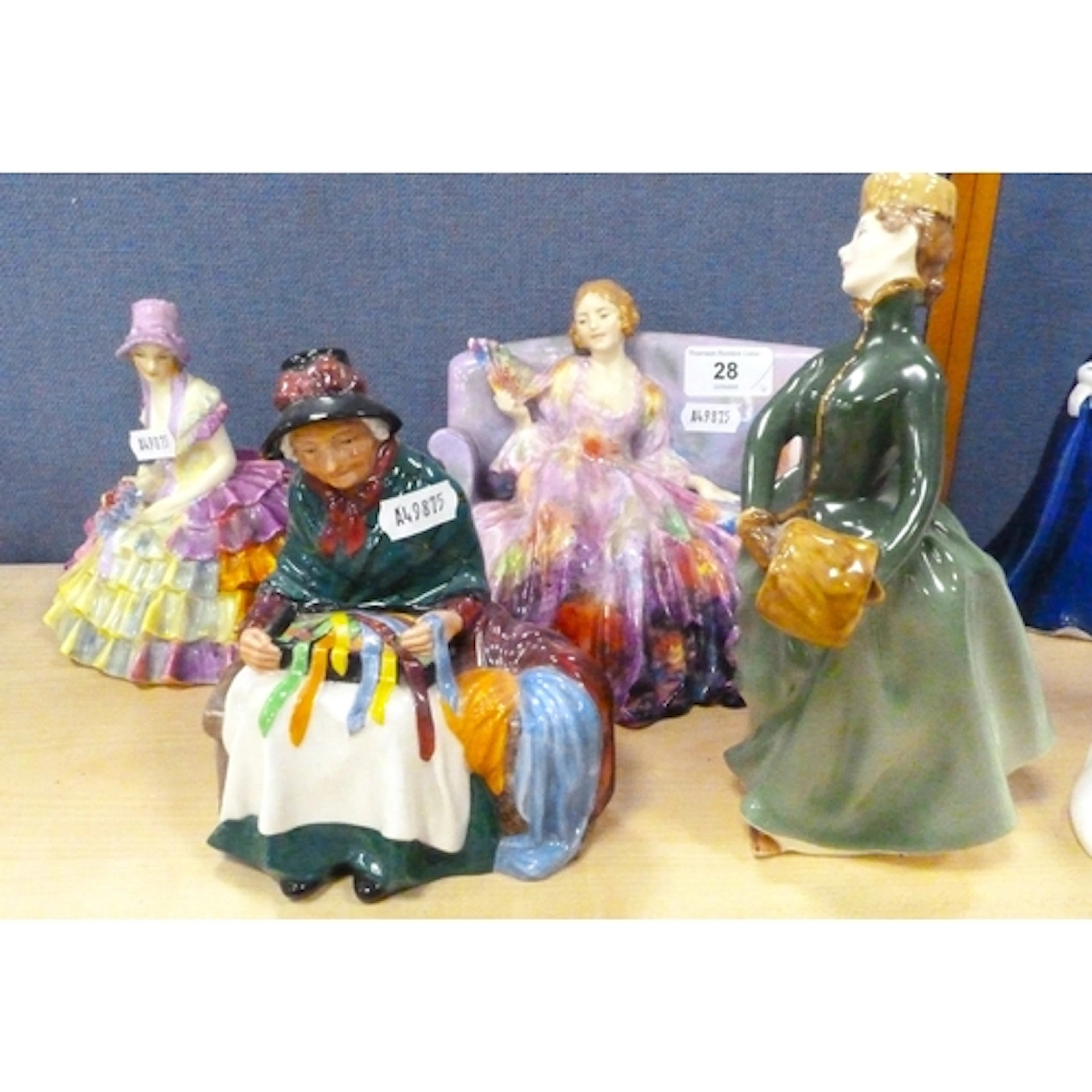 Four Royal Doulton figurines to include Sweet and Twenty and...