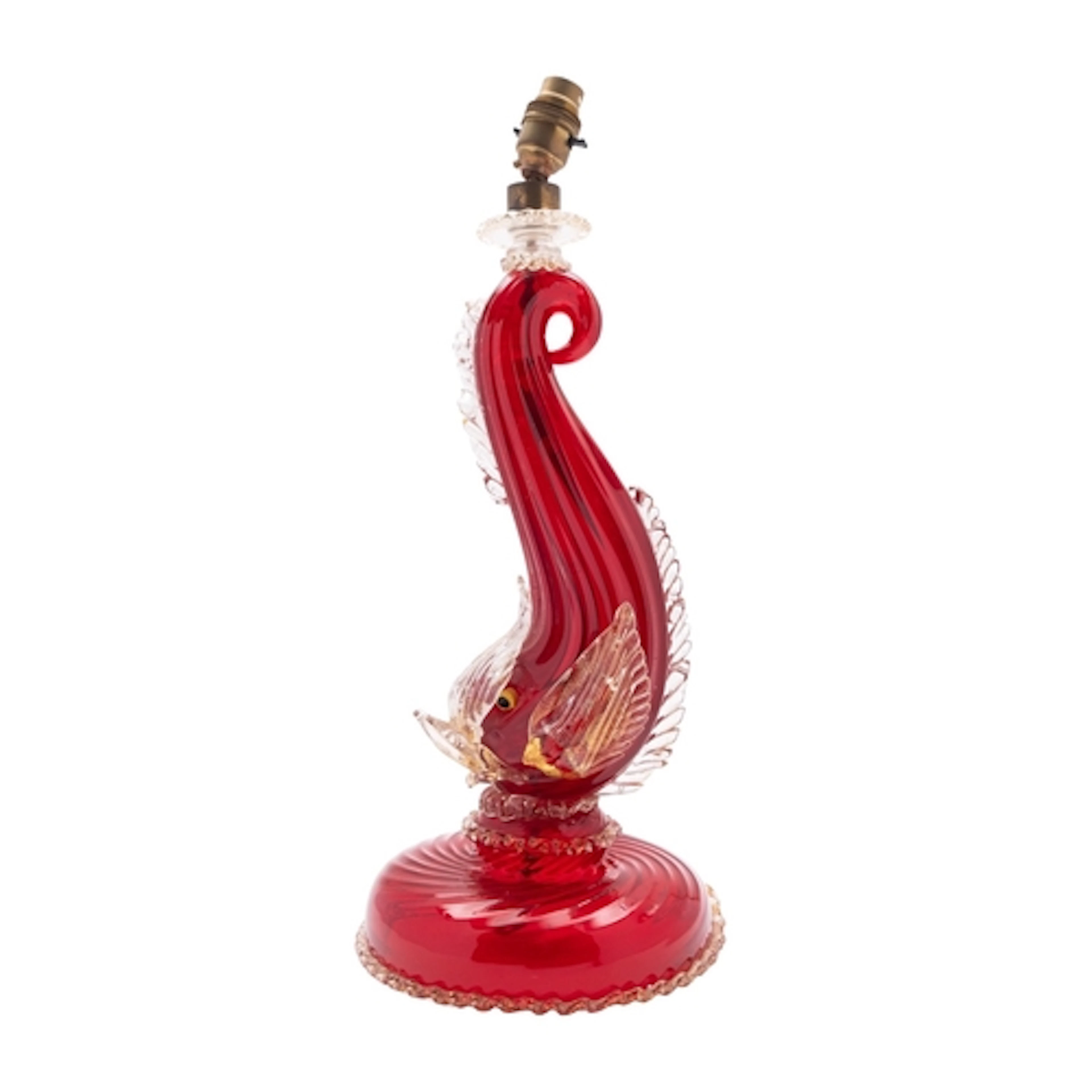 A Murano 'dolphin' lamp of red and clear gold flecked glass ...