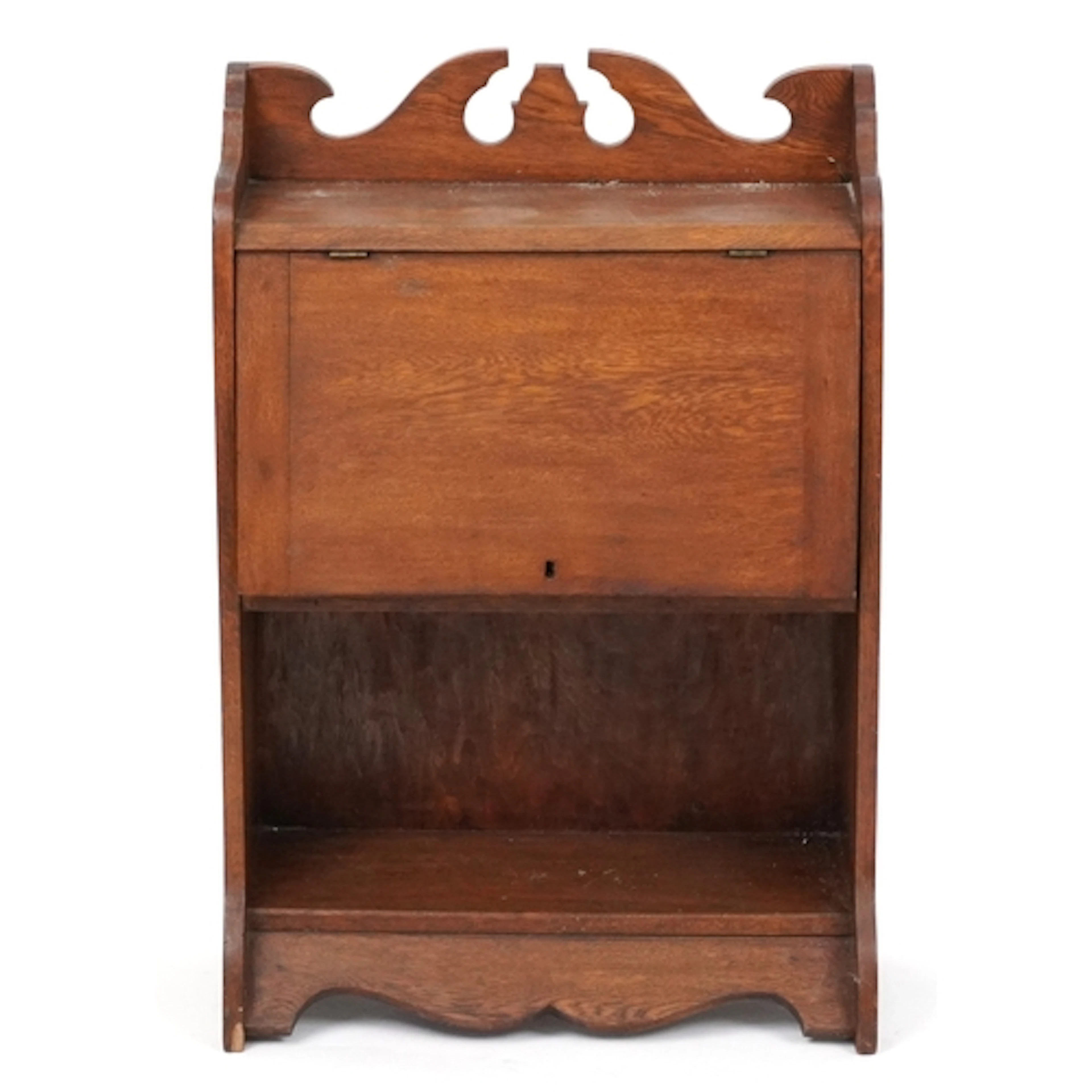 Arts & Crafts oak cabinet, the door enclosing a fitted inter...