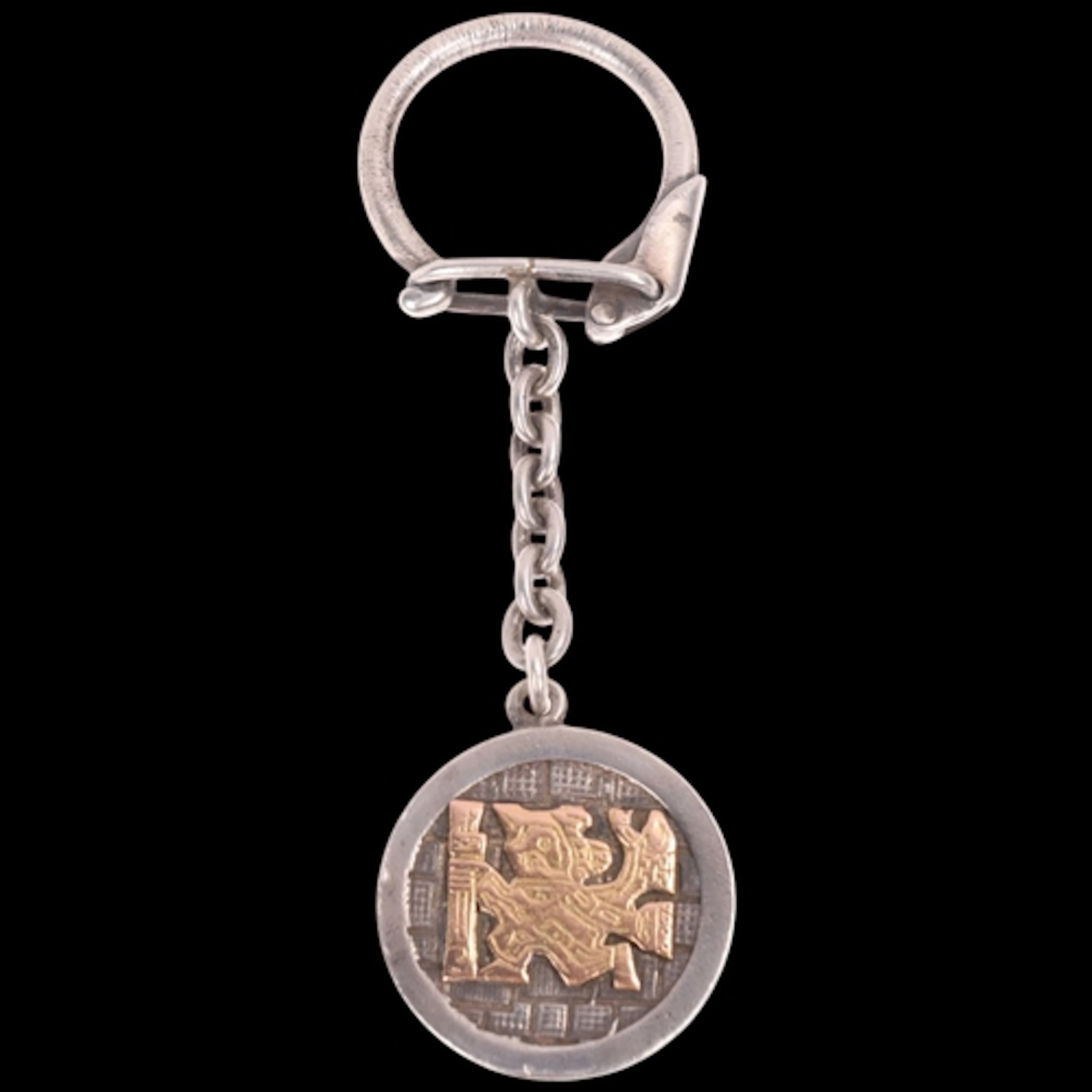 A Peruvian sterling silver and 18ct gold Inca/Aztec panel ke...
