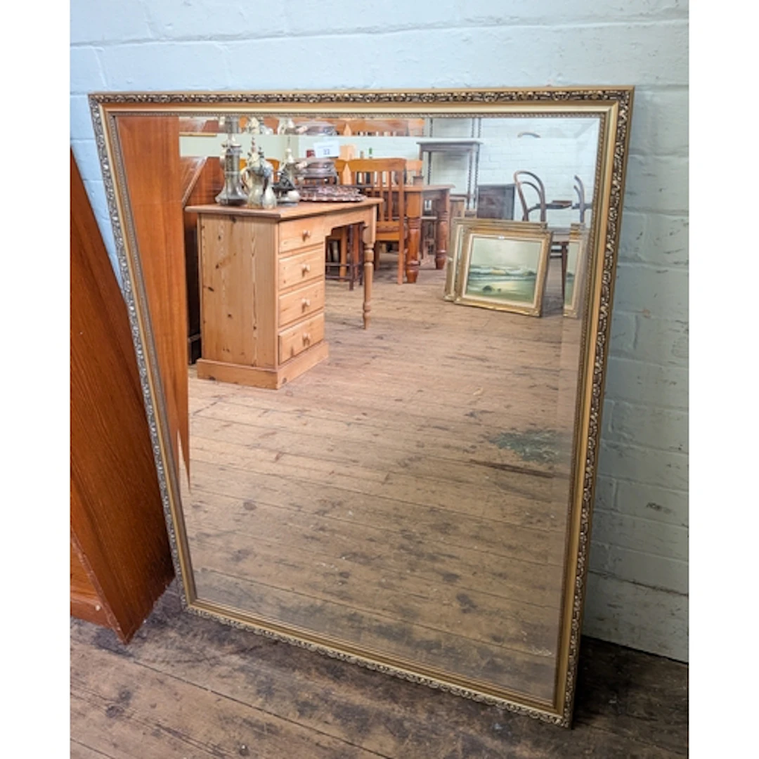 A large gilt framed bevelled edge wall mirror, overall size ...