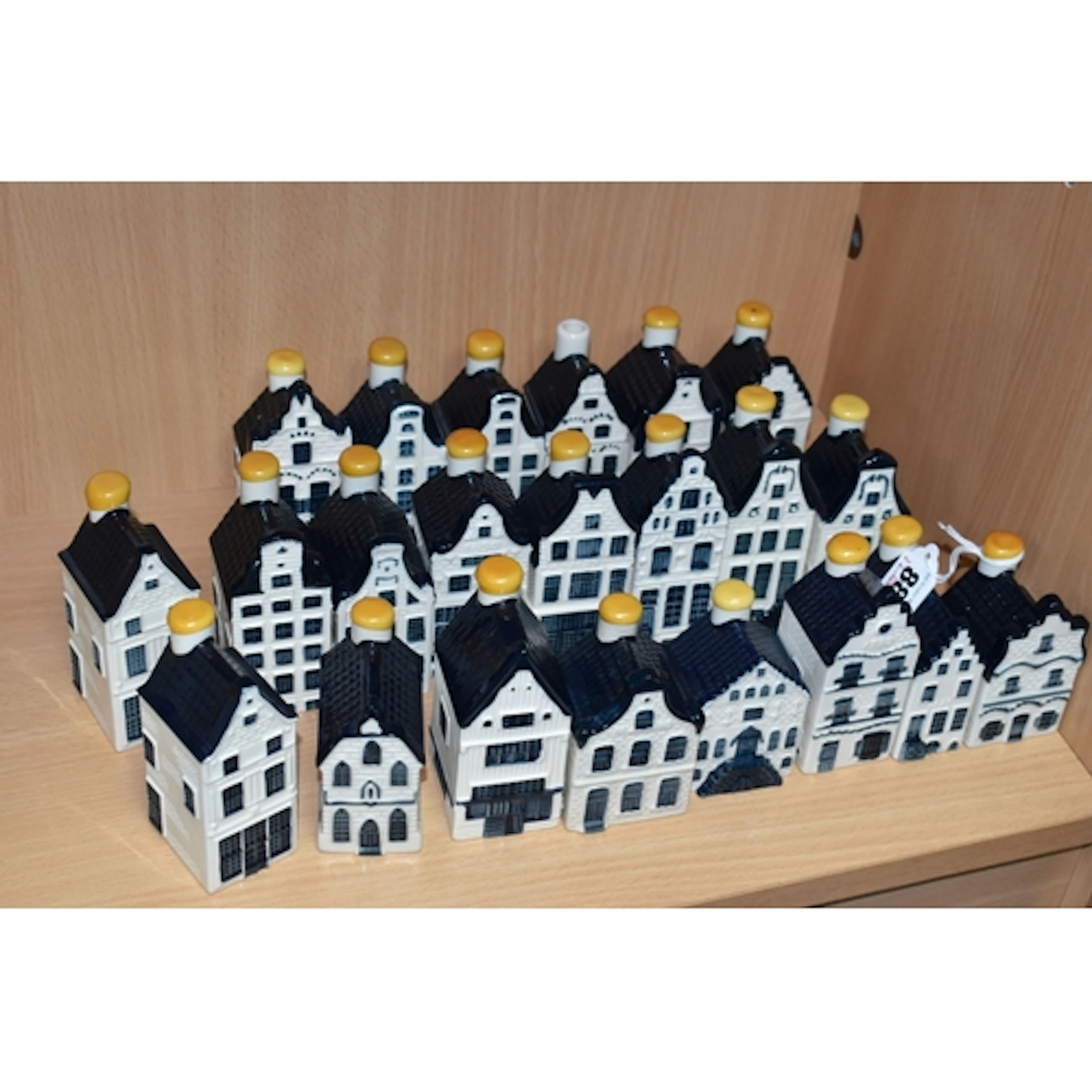 TWENTY TWO KLM BOLS WHISKY DECANTERS, blue delft in the form...