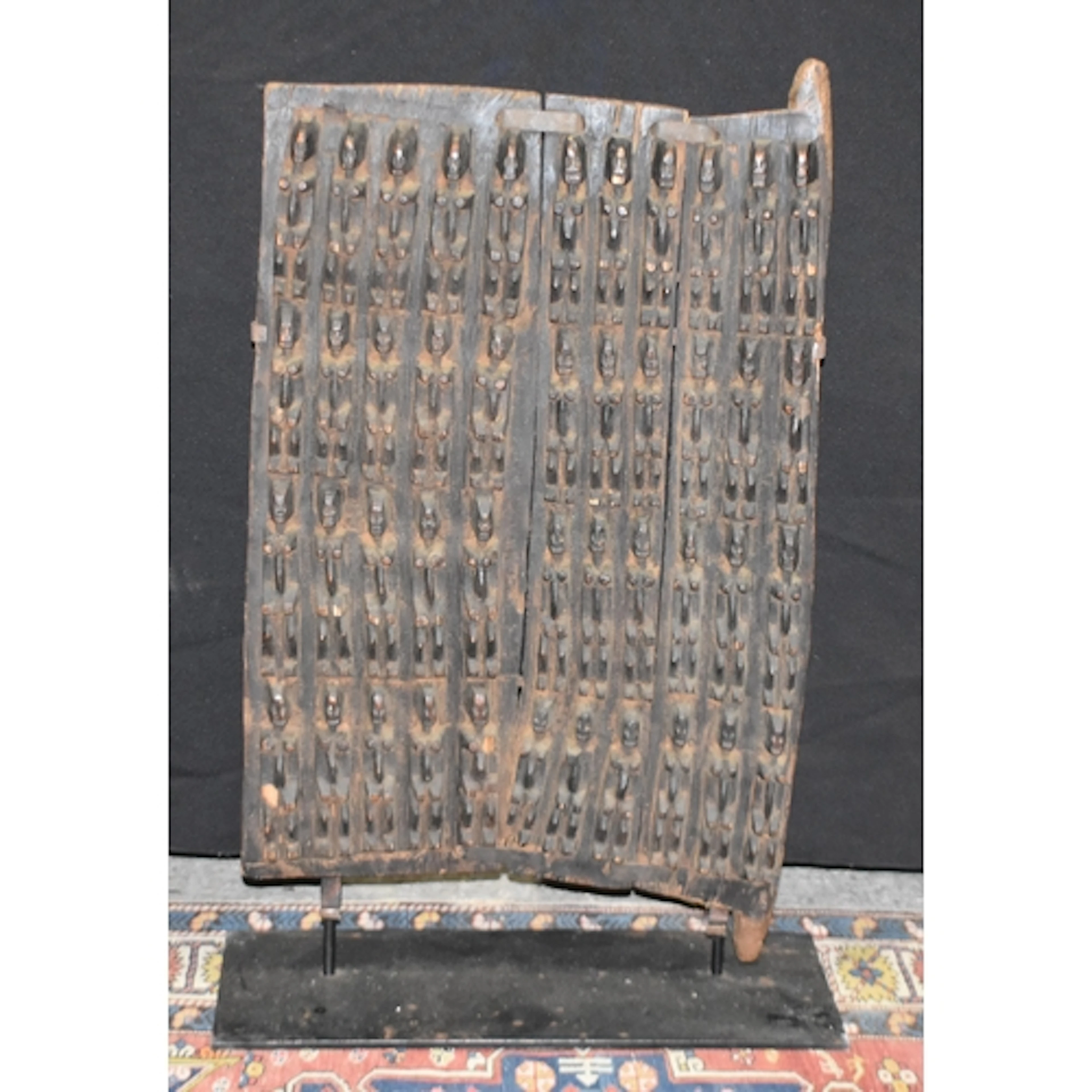An African Tribal Dogon carved wood door 75 x 43cm