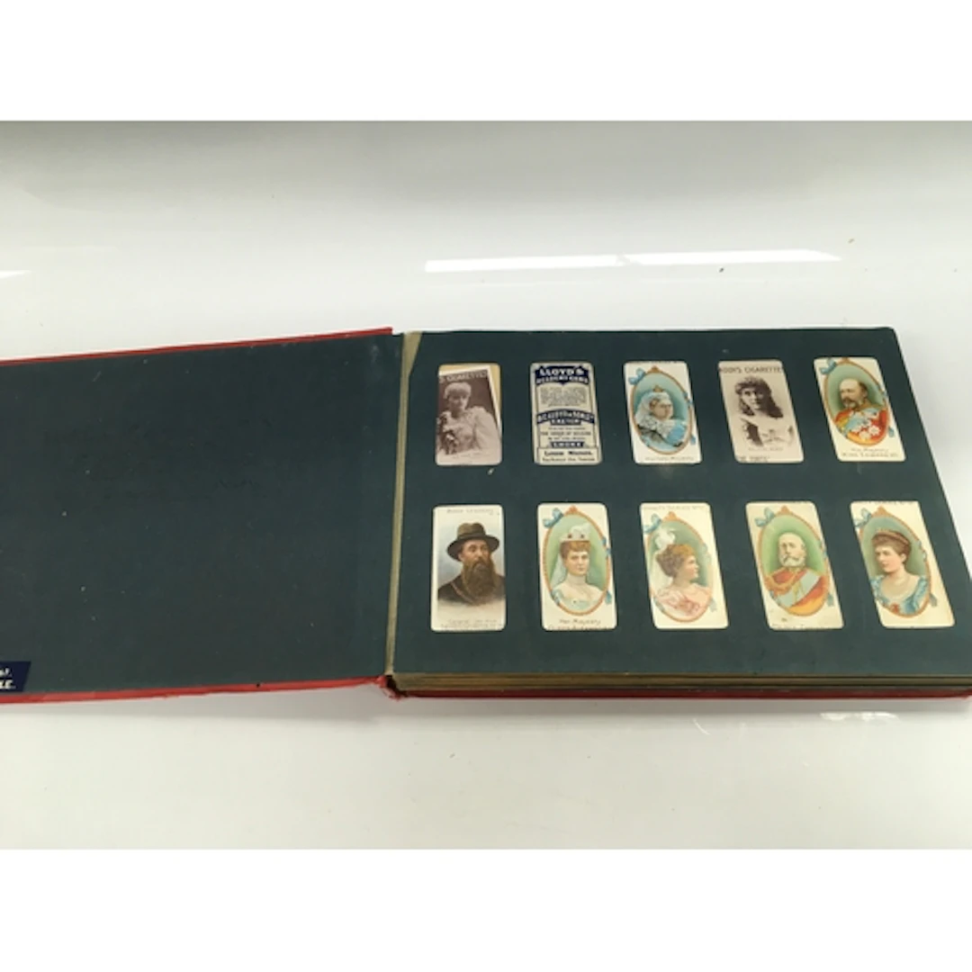 An antique cigarette cards in album.
