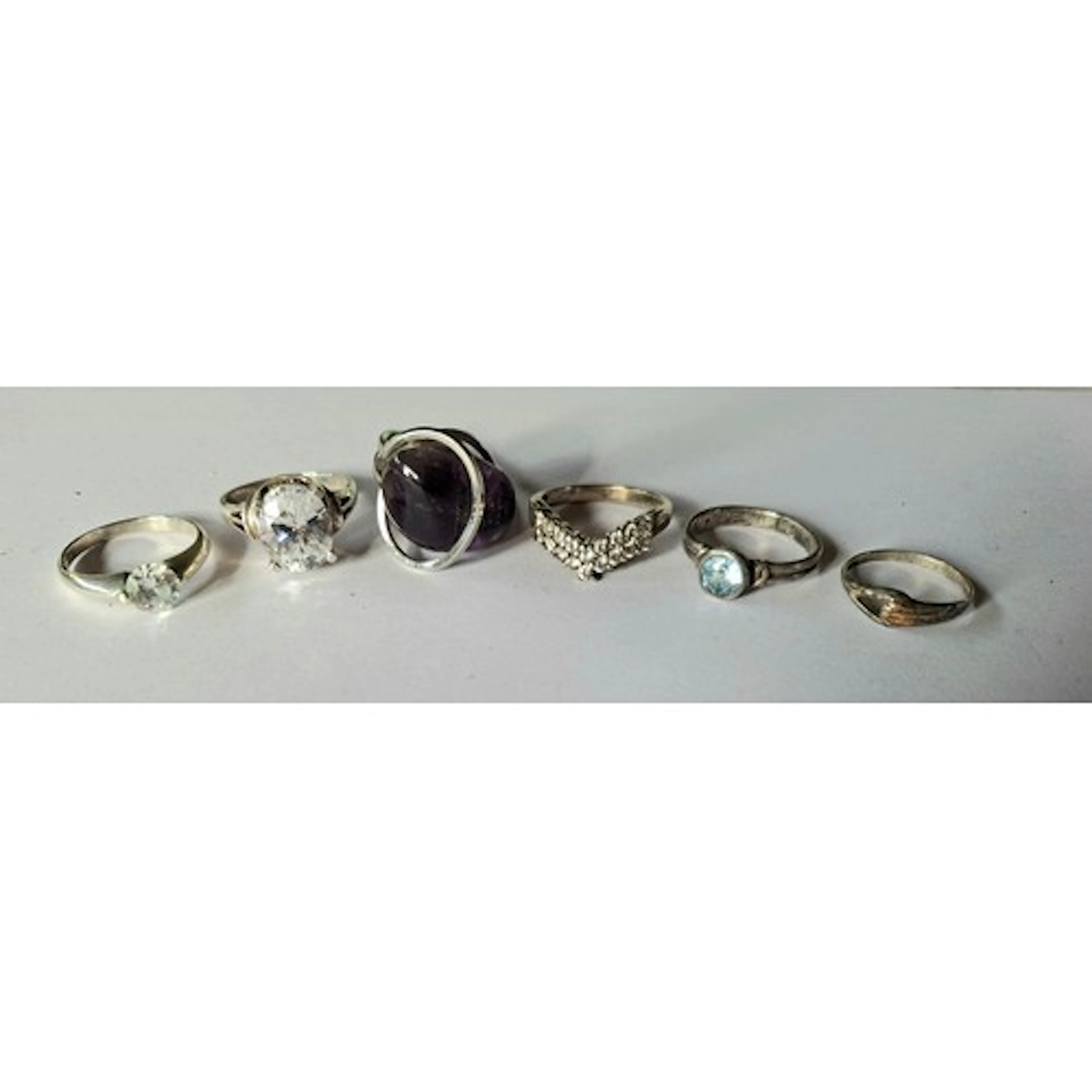 Six silver and white metal dress rings to include a silver r...