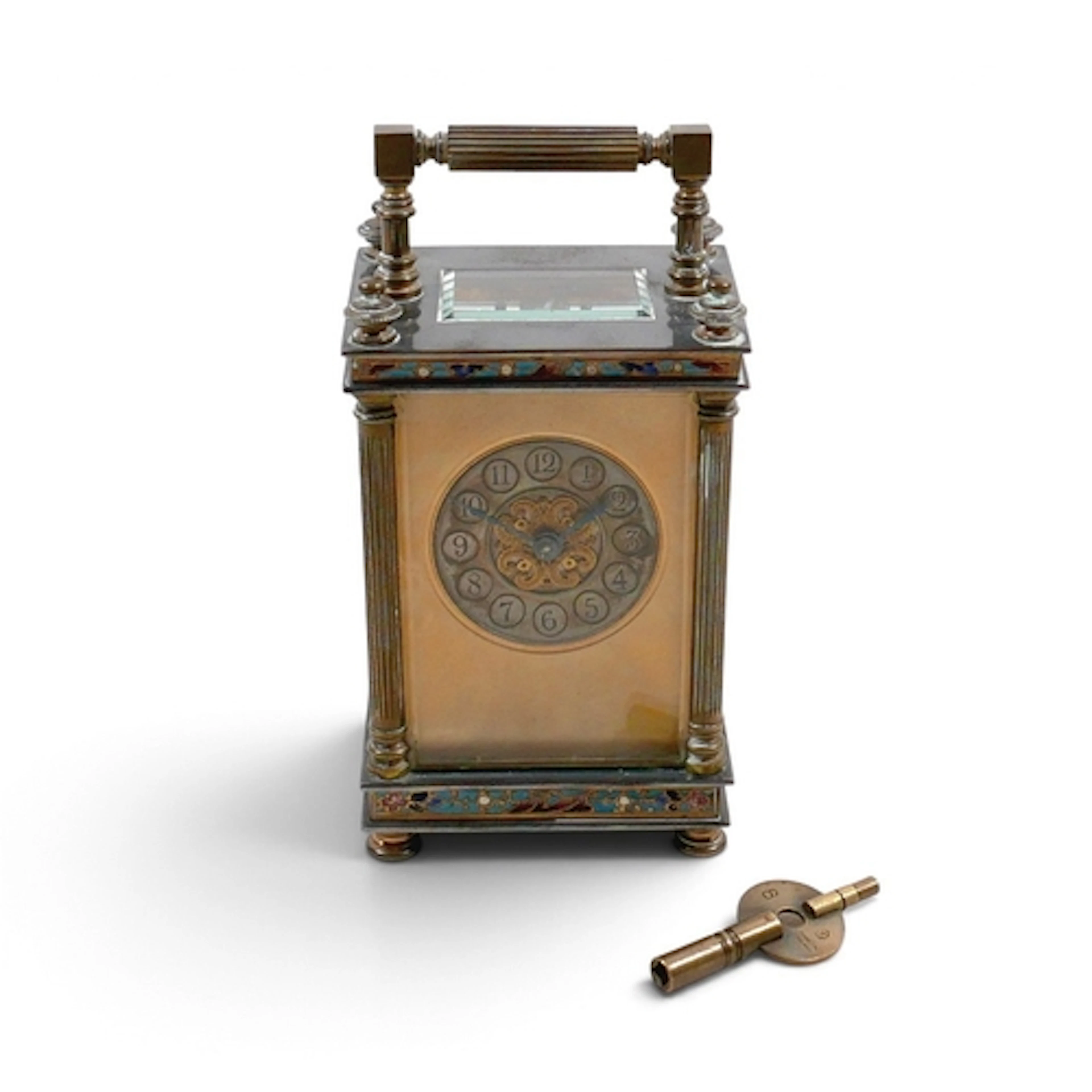 A 19TH CENTURY FRENCH BRASS CARRIAGE CLOCK. decorated with c...