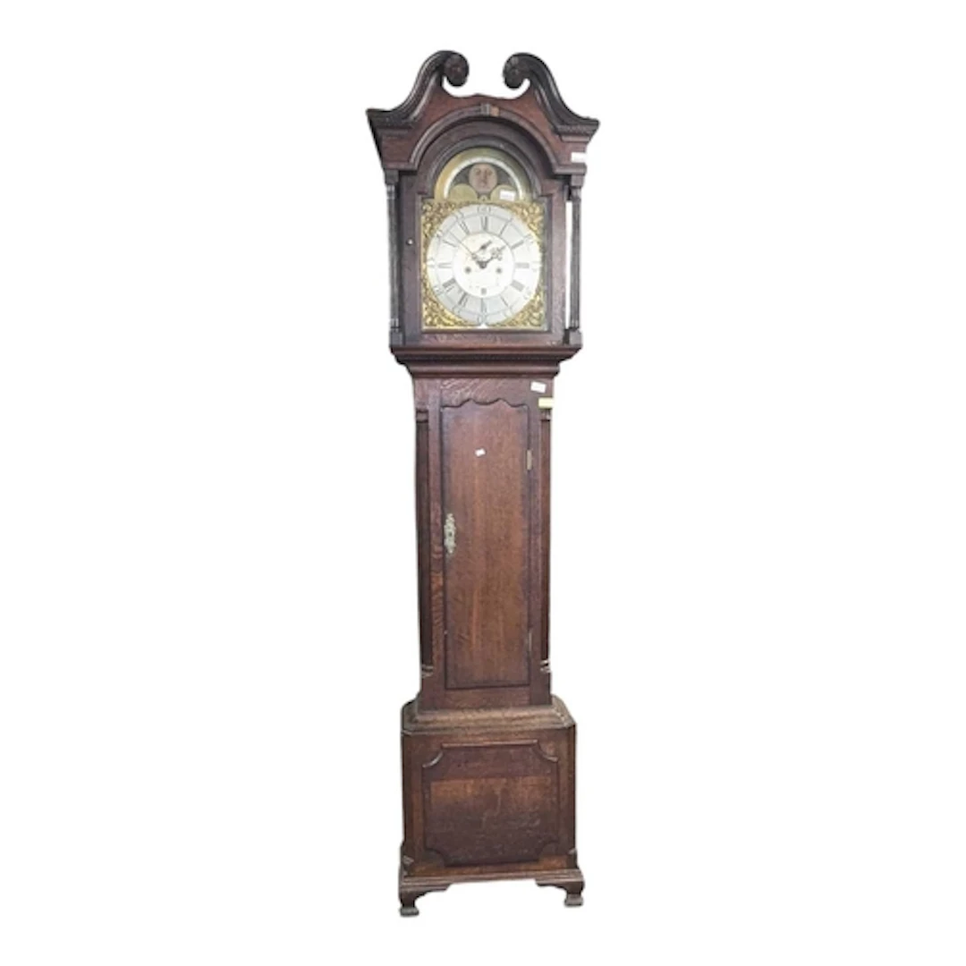 A 19th century George III mahogany longcase grandfather cloc...