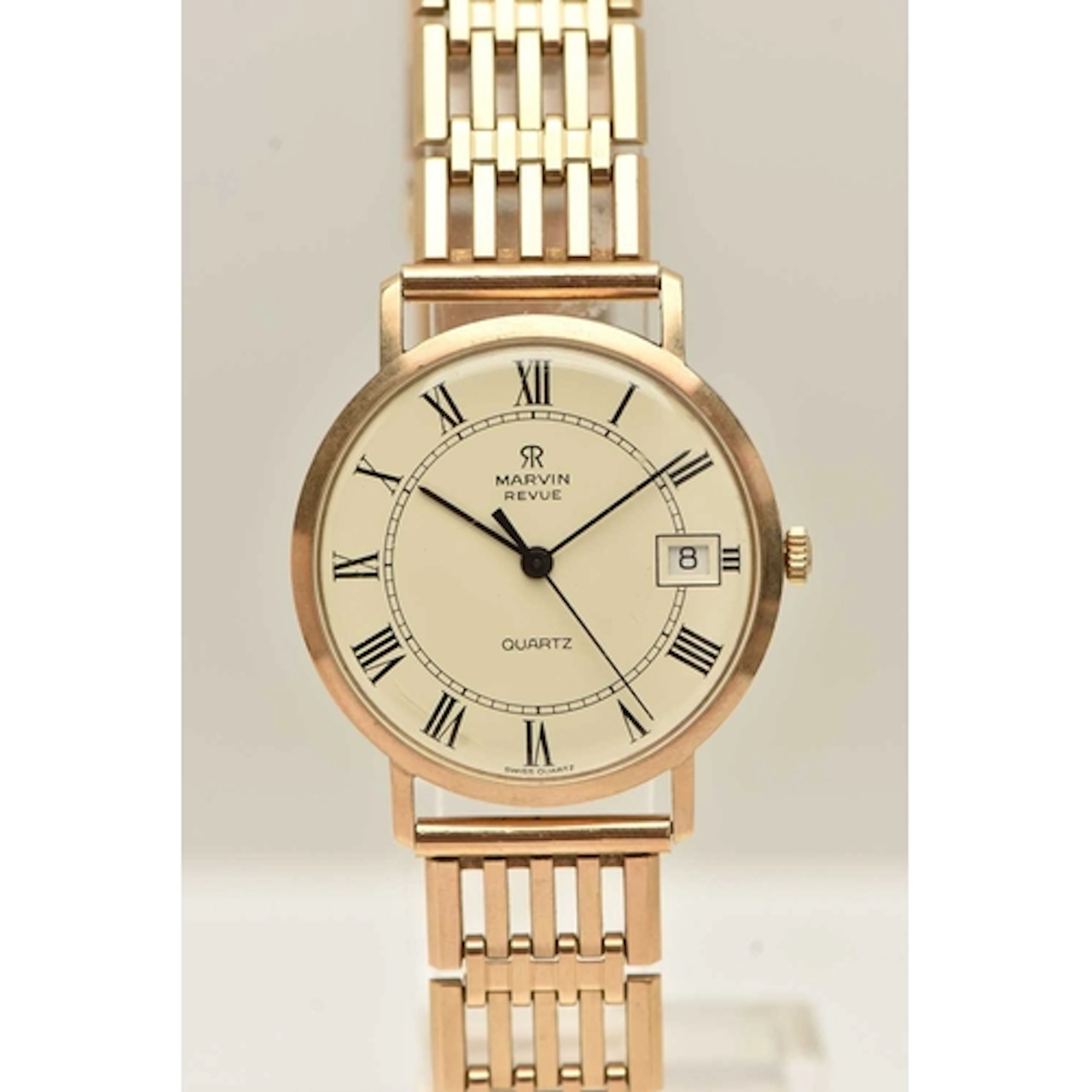 A GENTS 9CT GOLD 'MARVIN REVUE' WRISTWATCH, quartz movement,...