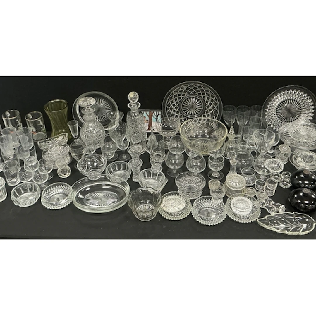 Glassware - a crystal cut decanter featuring a fluted neck o...