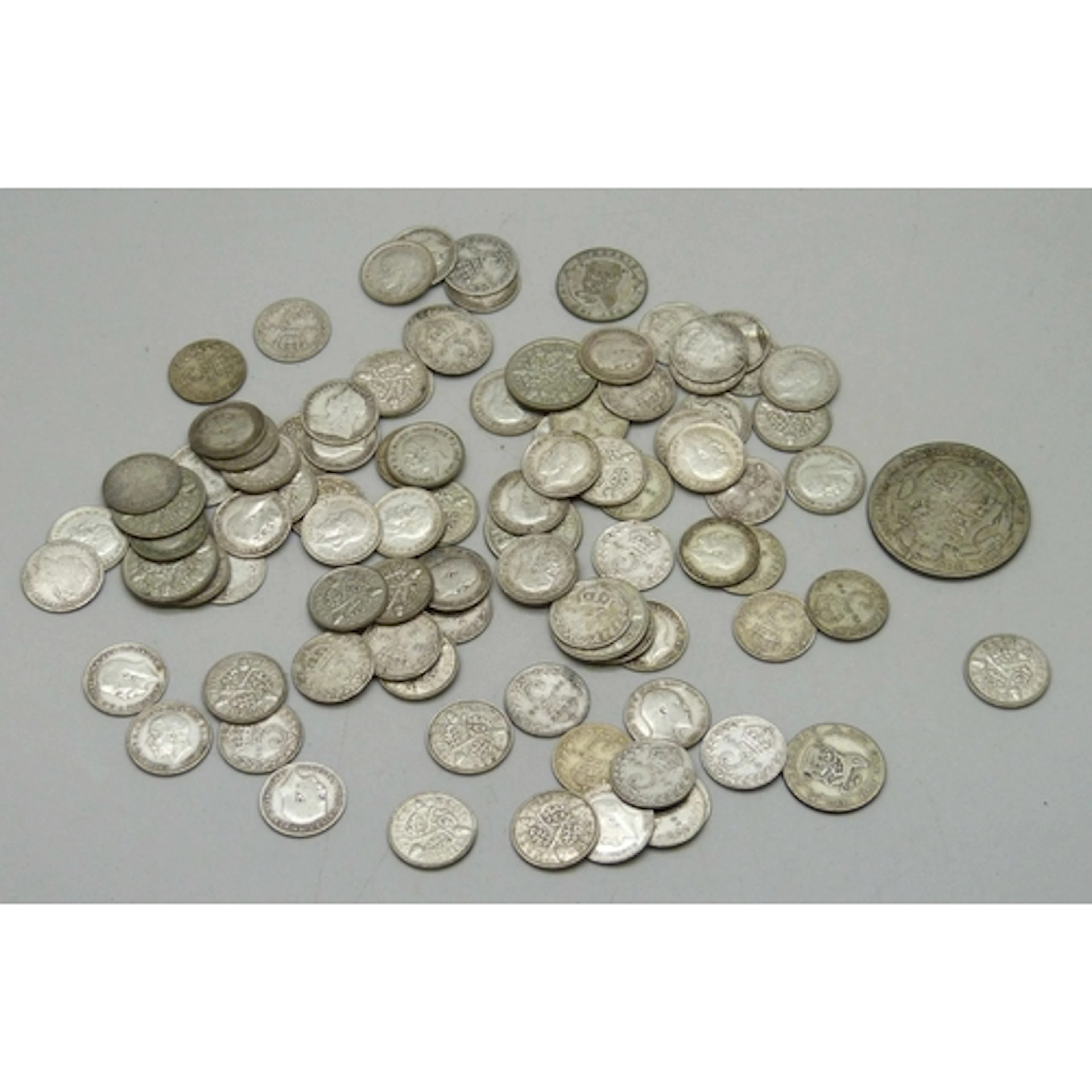 A collection of silver and half silver coins, 151g total