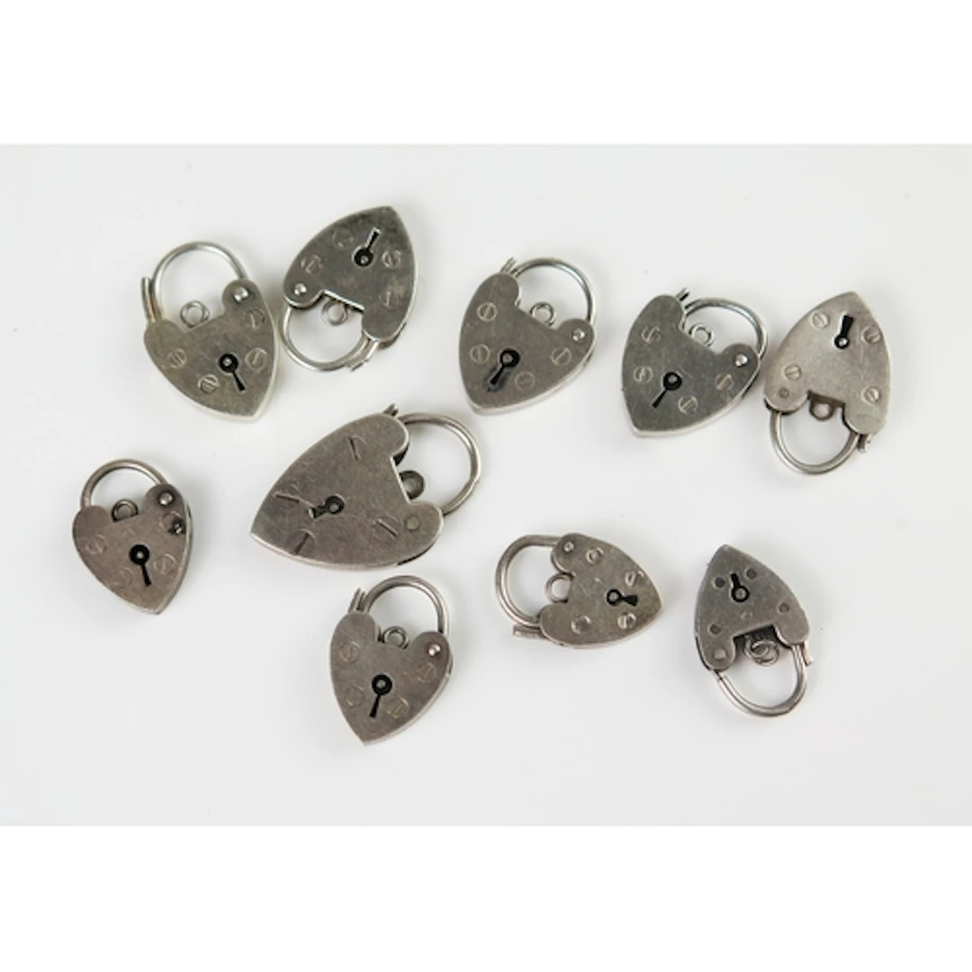 Ten silver 'padlock' clasps, 20.1g