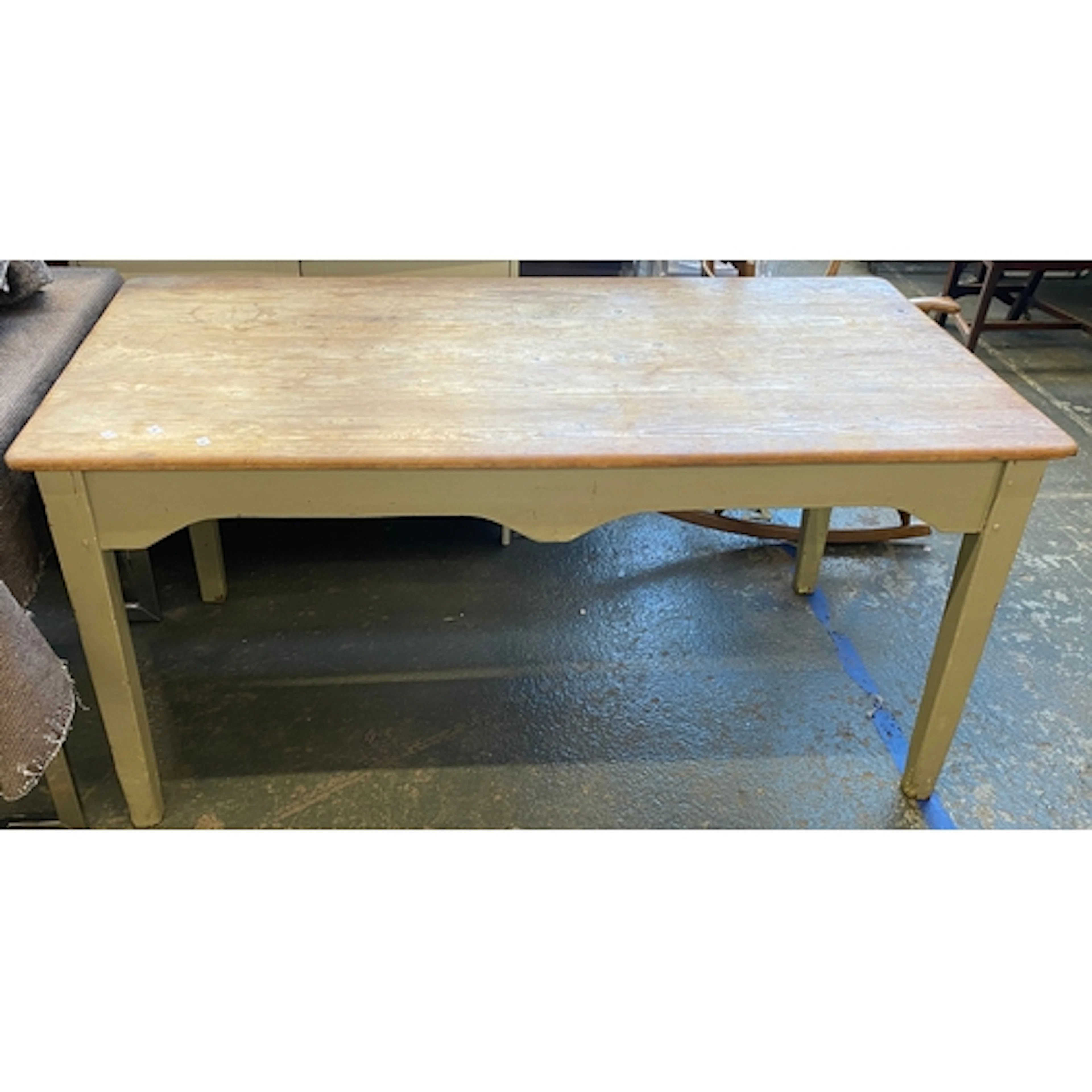 A 19th/early 20th century pine kitchen table with a grey pai...