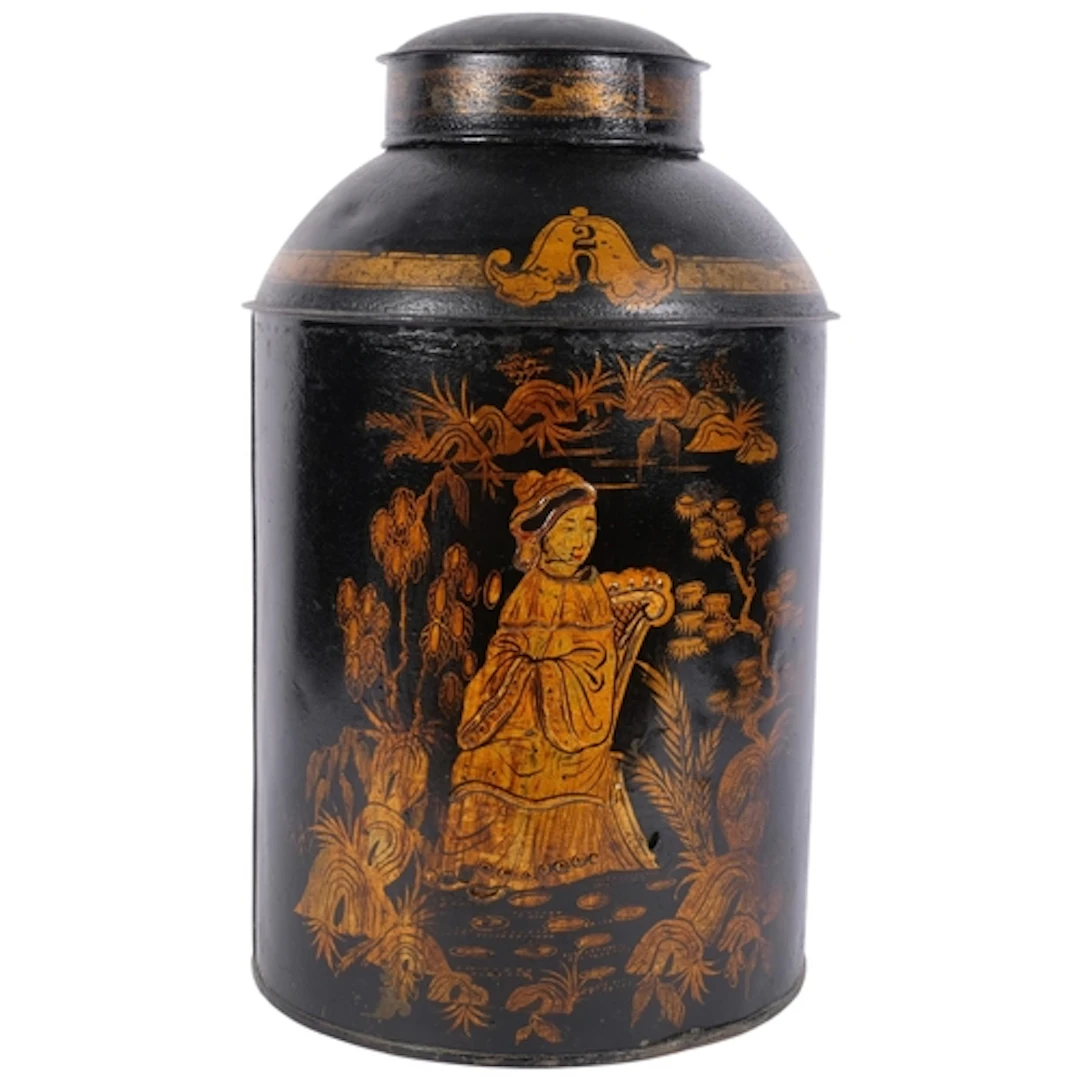 A black lacquered and gilded Oriental design tea caddy, Tole...