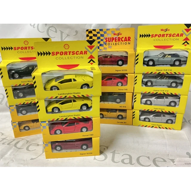 A Collection Of Boxed Maisto And Shell ar Collection, ...