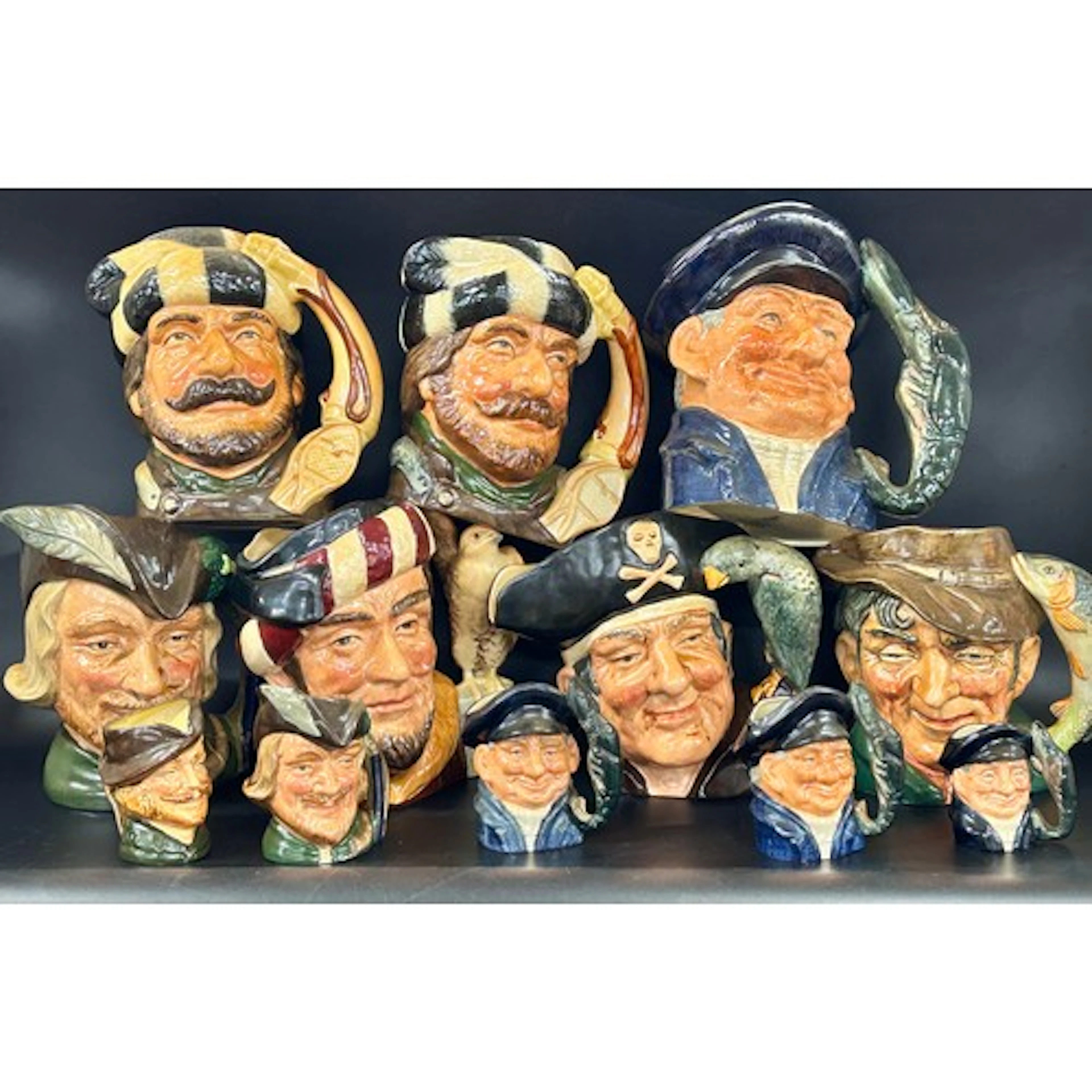 Seven large Royal Doulton Character jugs and five miniatures...