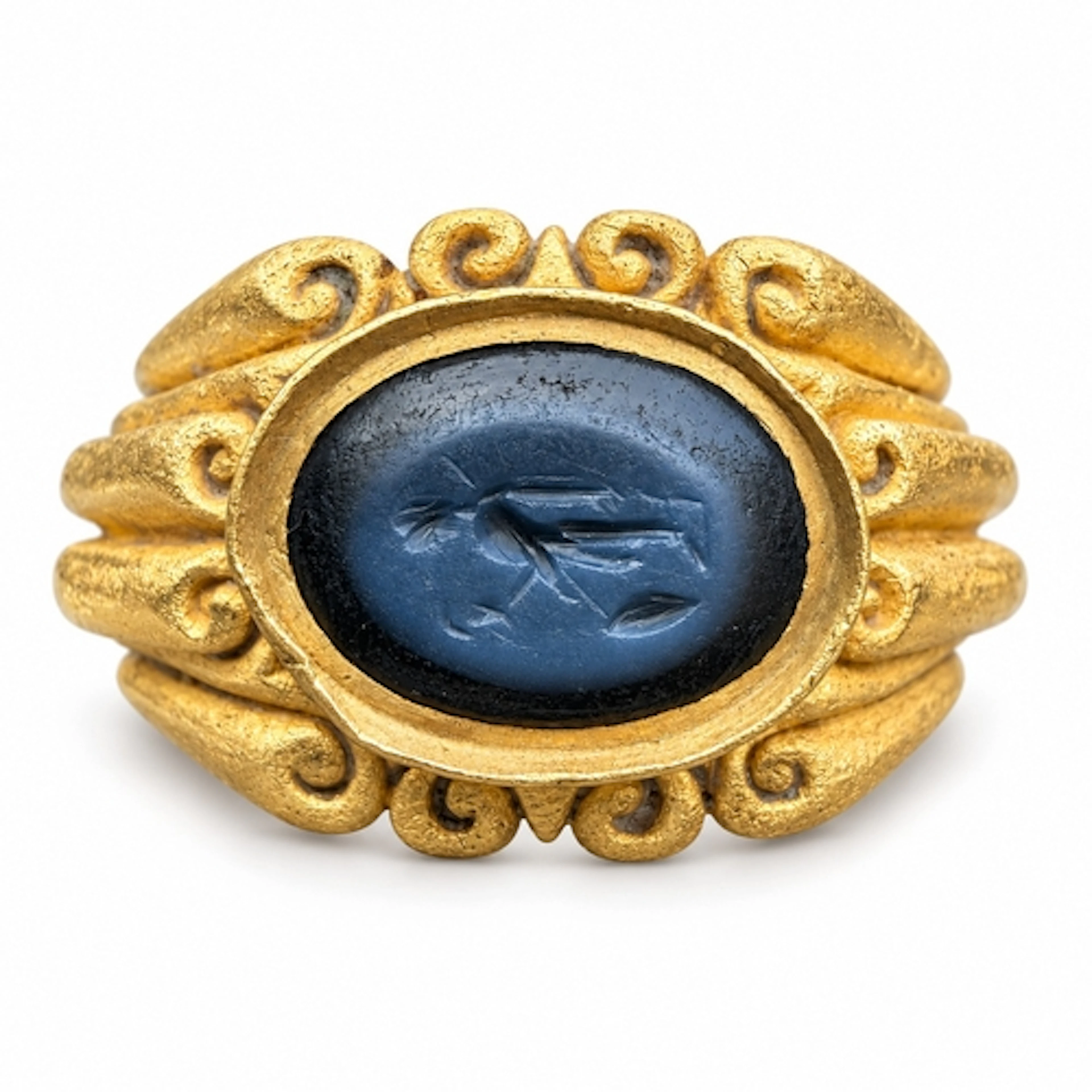 A substantial and finely worked Roman gold ring, the broad s...
