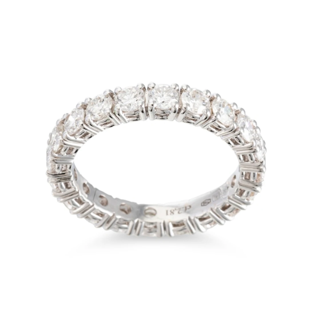 A DIAMOND FULL BANDED ETERNITY RING, the round brilliant cut...