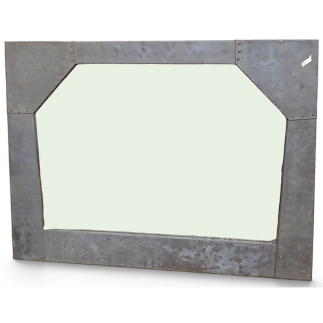 A 20th century Arts & Crafts style wall mirror with shap...