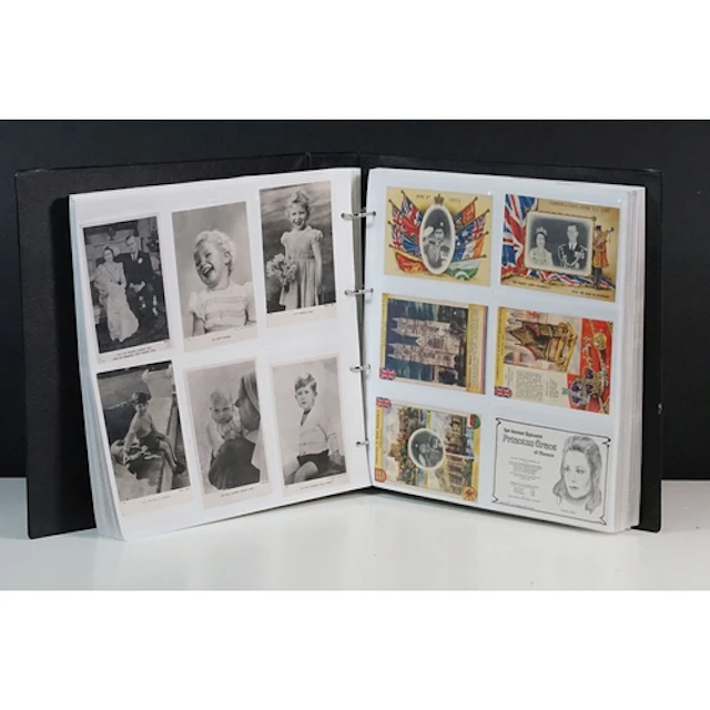 Postcard album containing a large collection of royal relate...