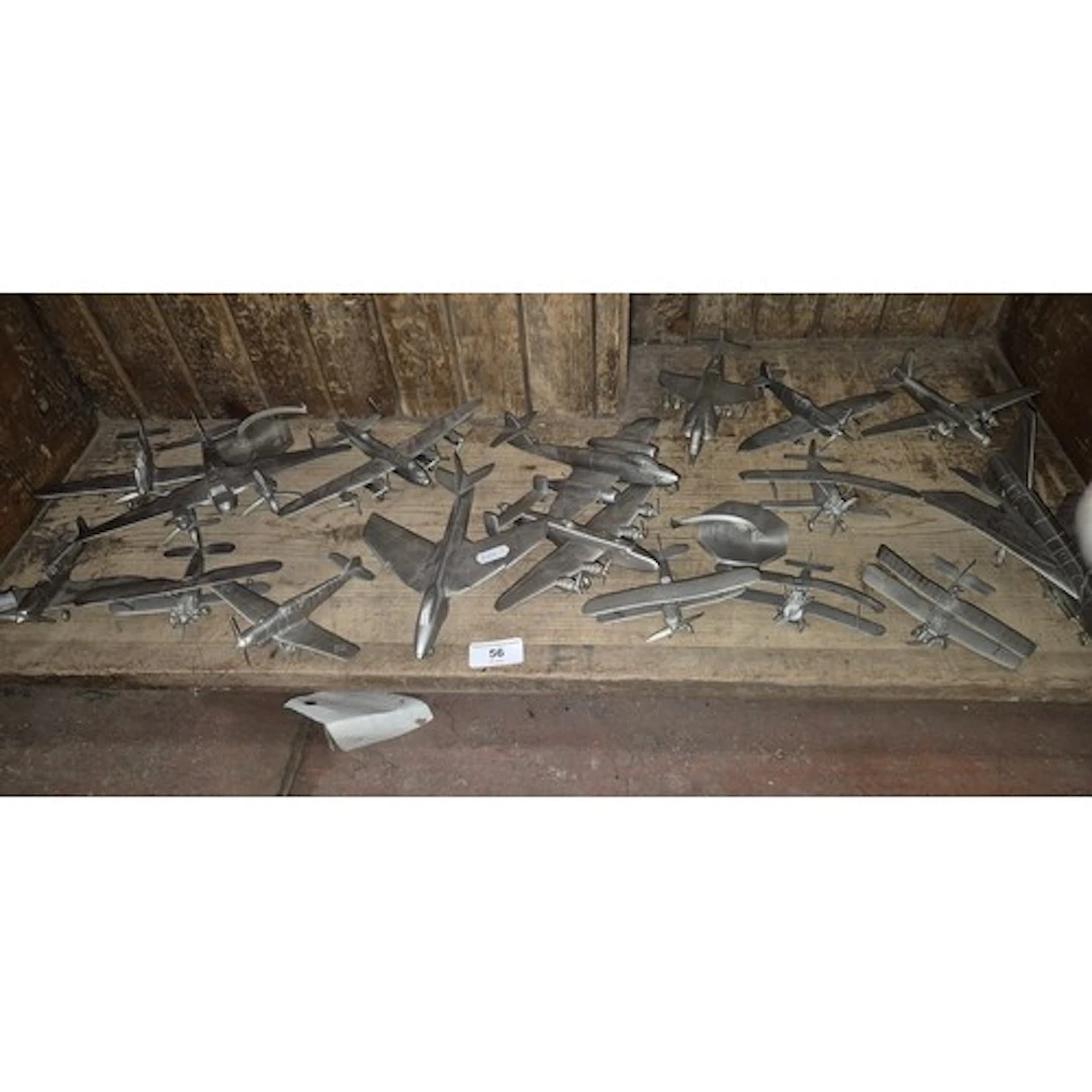 A collection of 17 cast metal aeroplanes.