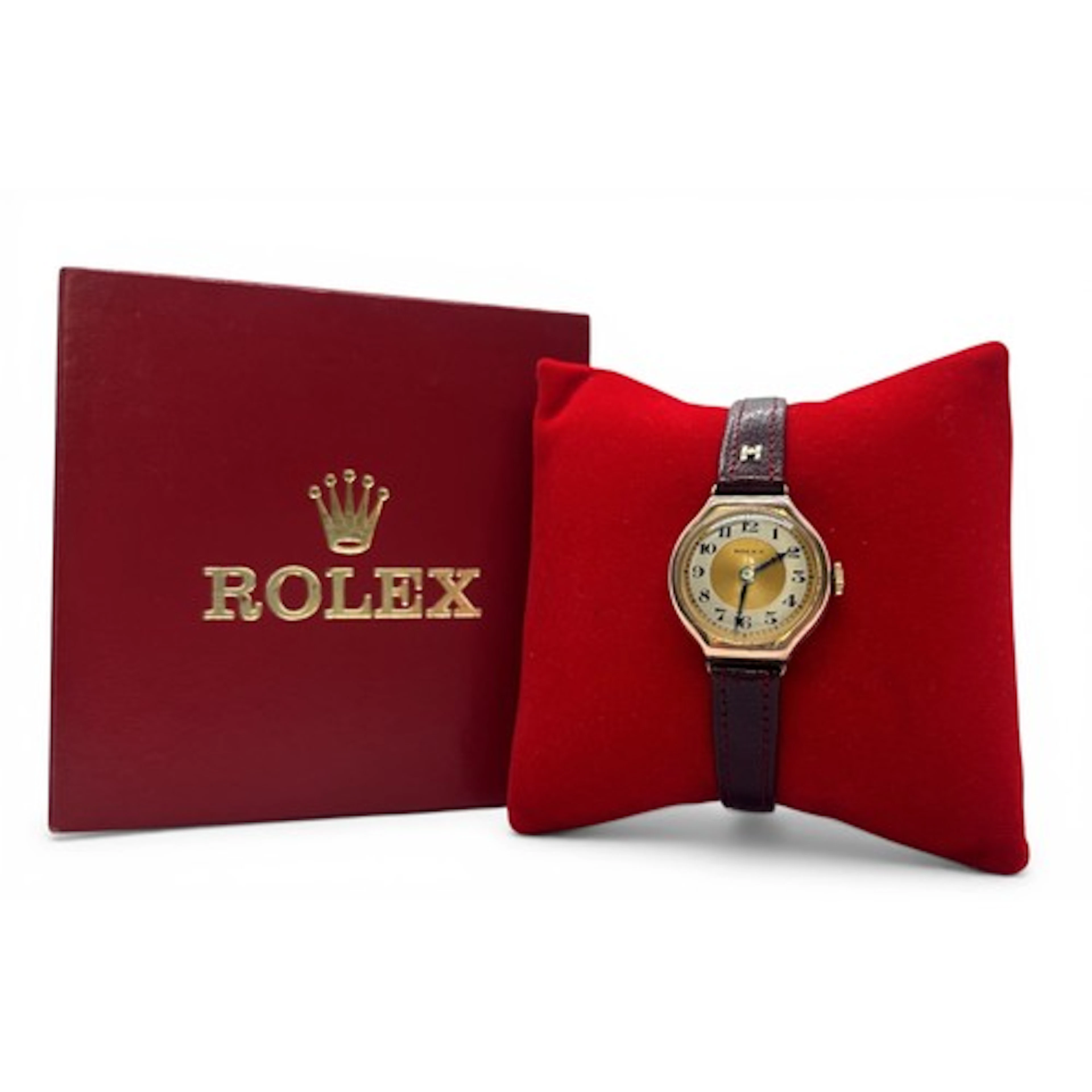 Rolex. A vintage 9ct rose gold cased wristwatch, the signed ...