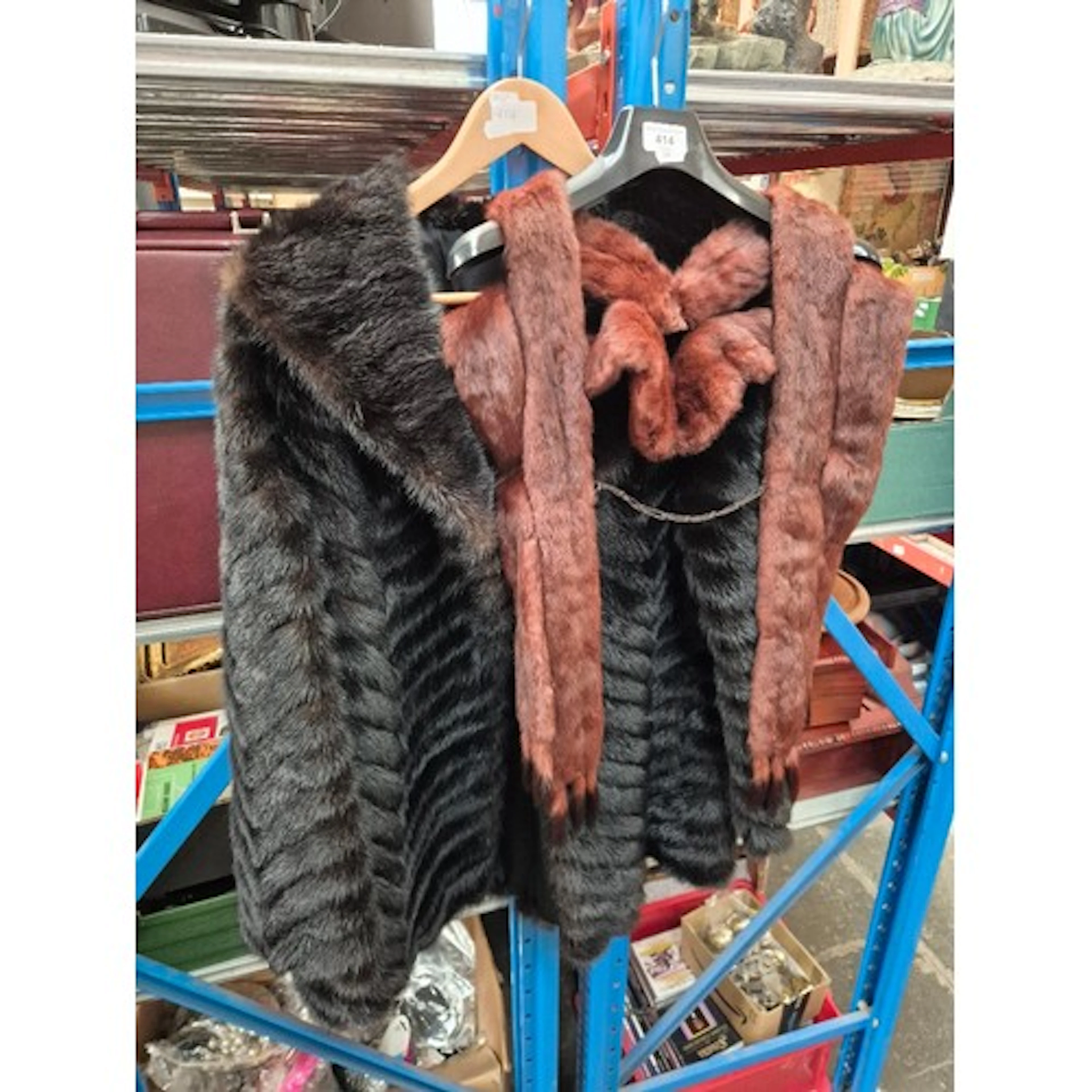 A vintage fur jacket together with a stole.