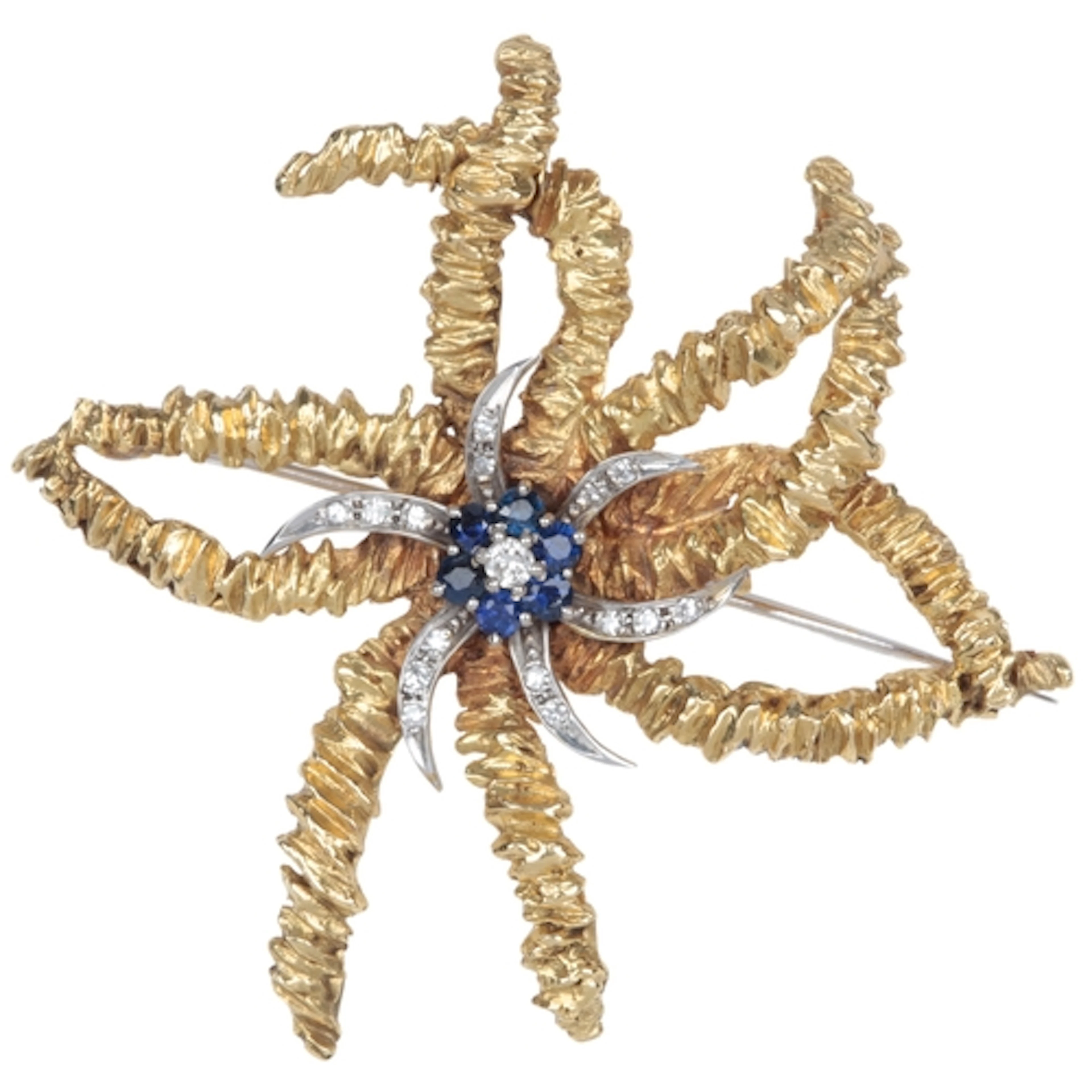 Cropp & Farr, a gold, sapphire and diamond brooch, circa 197...