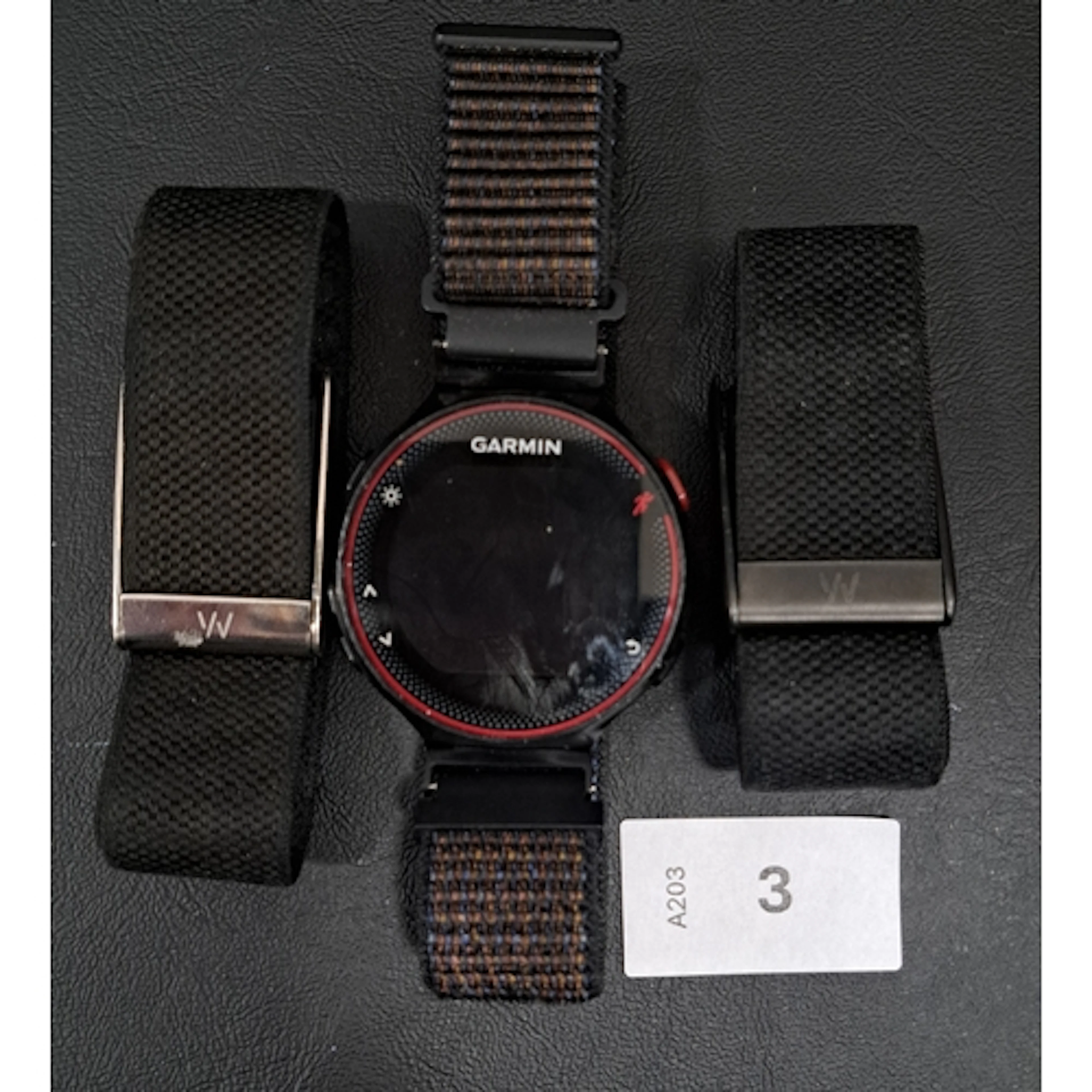 THREE FITNESS TRACKERS COMPRISING GARMIN FORERUNNER 235, WHO...