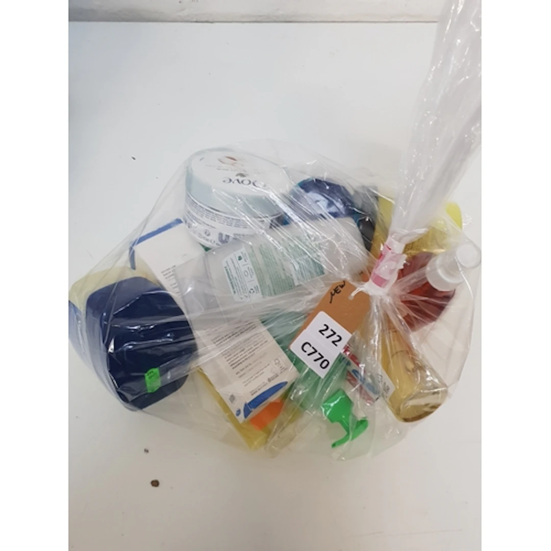 ONE BAG OF NEW AND USED COSMETICS including Dove and Vaseli...