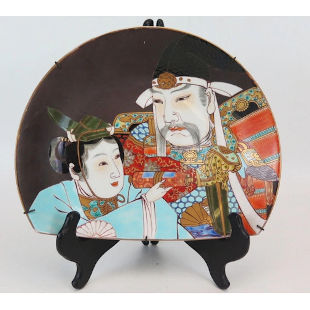 An unusual Japanese wall hanging dish decorated in the Satsu...