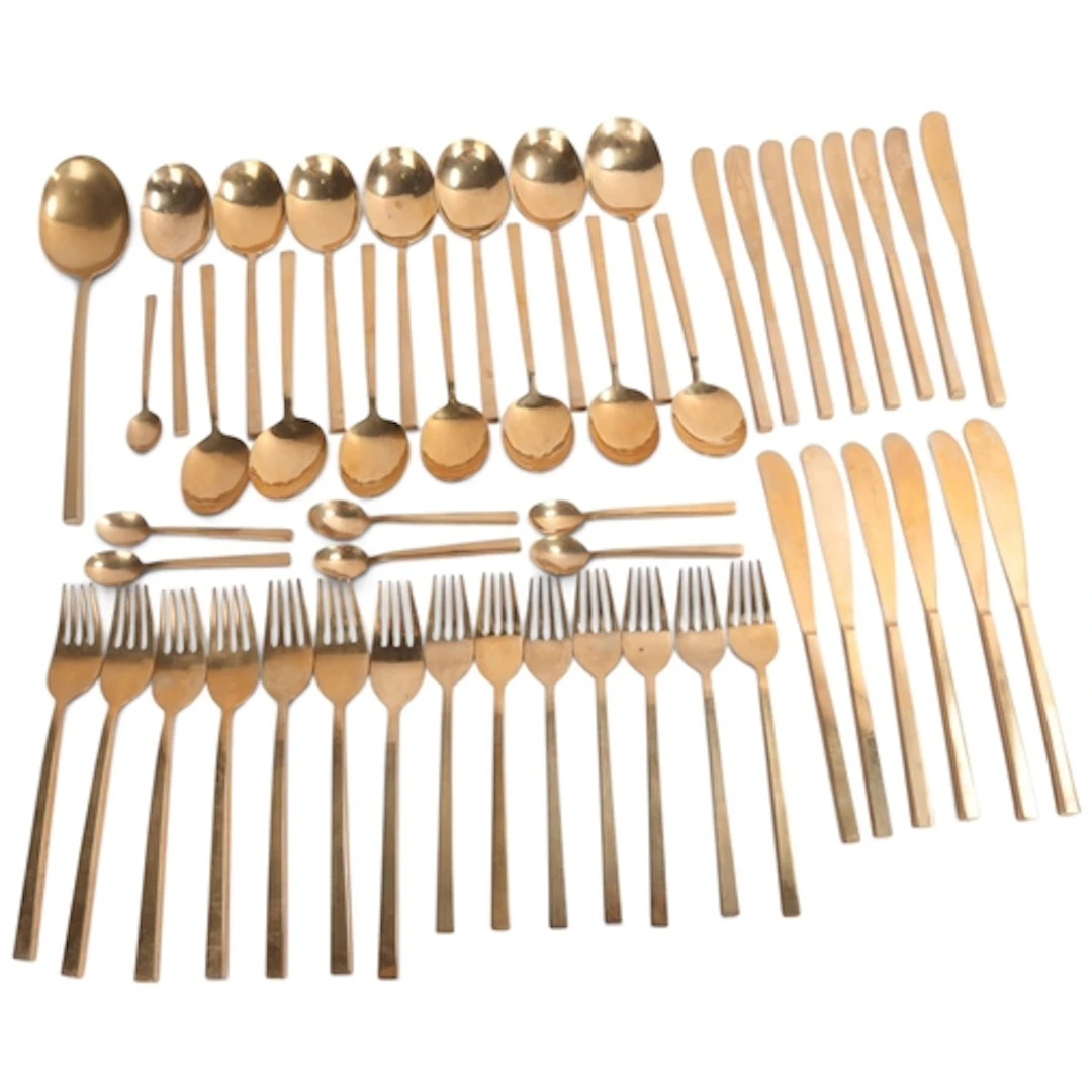 A set of mid-century bronze cutlery in the style of Scanline...