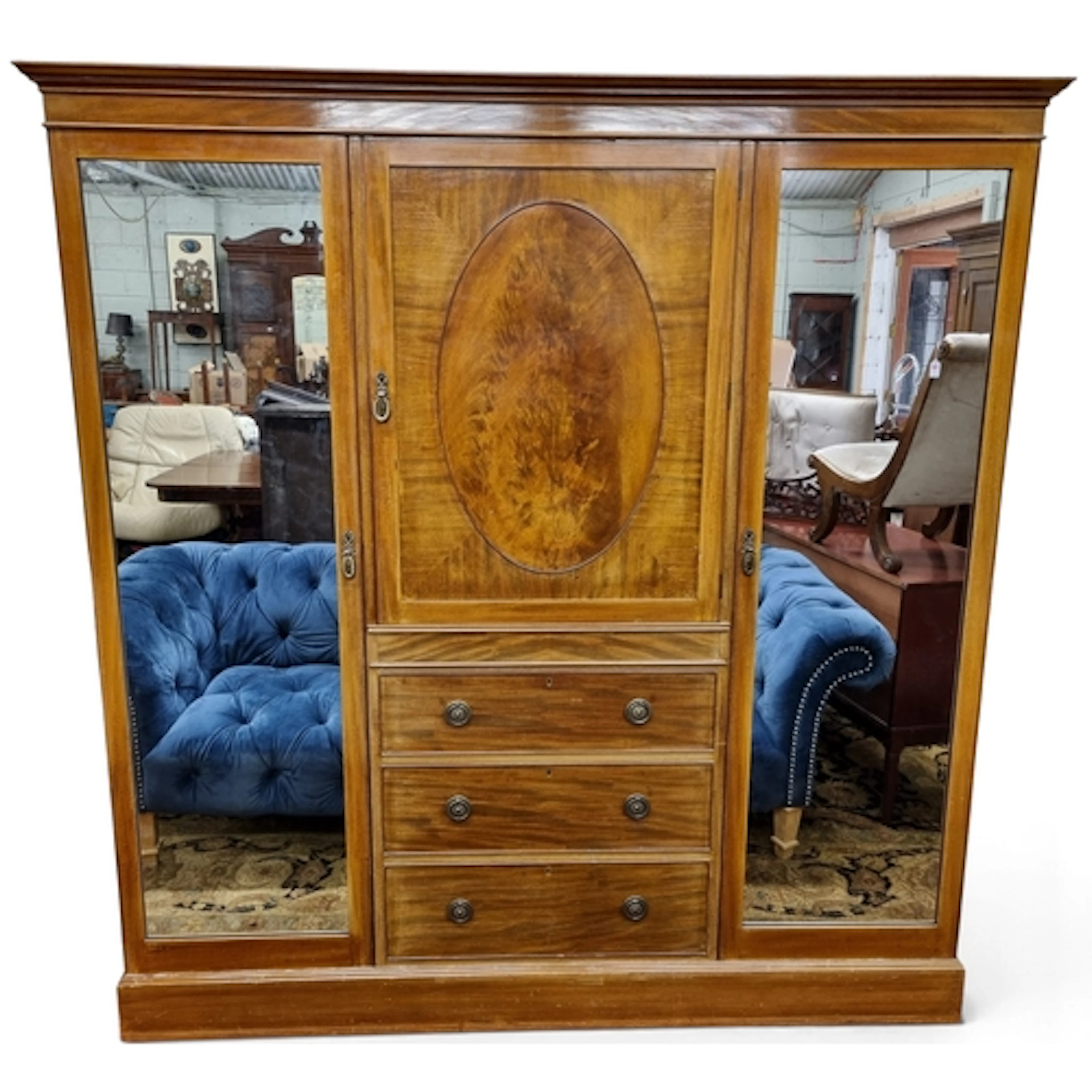 A really good Edwardian Mahogany three door Wardrobe with an...