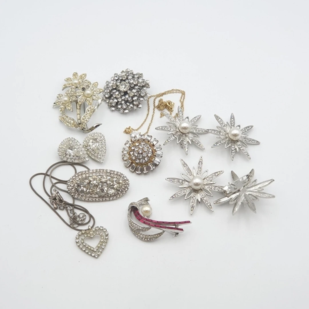 A collection of paste-set Jewellery including; nine Brooches...