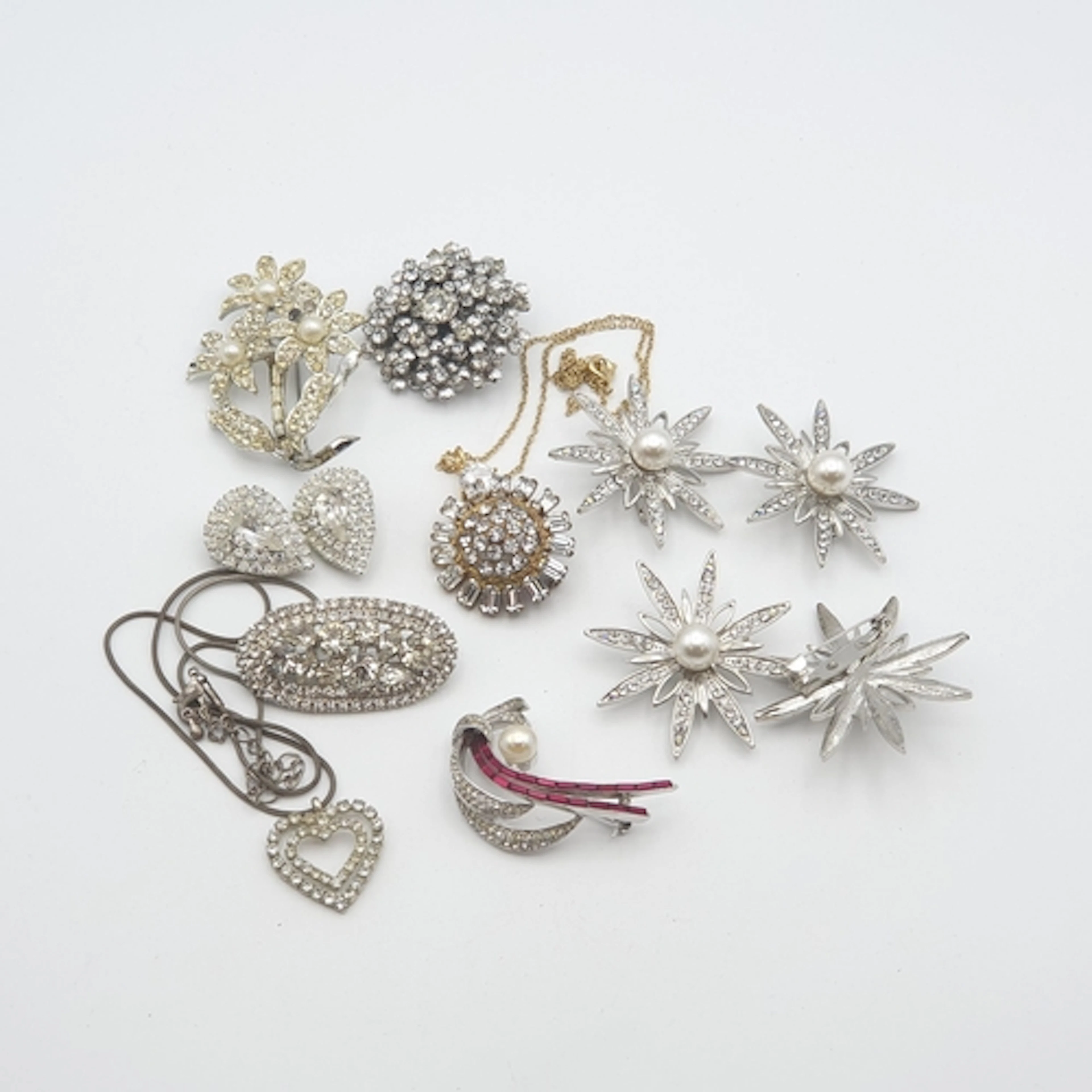 A collection of paste-set Jewellery including; nine Brooches...