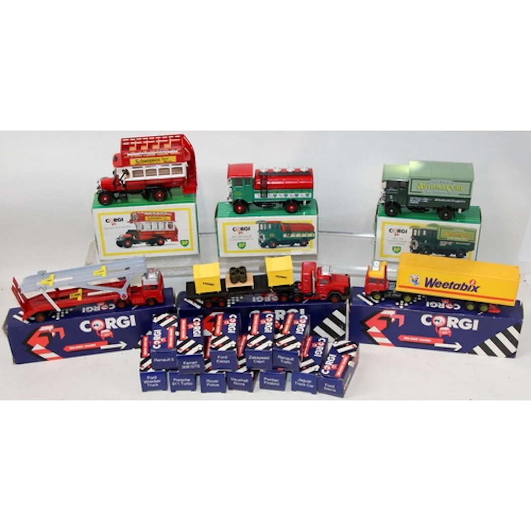 A collection of boxed Corgi die-cast model vehicles, 18 item...