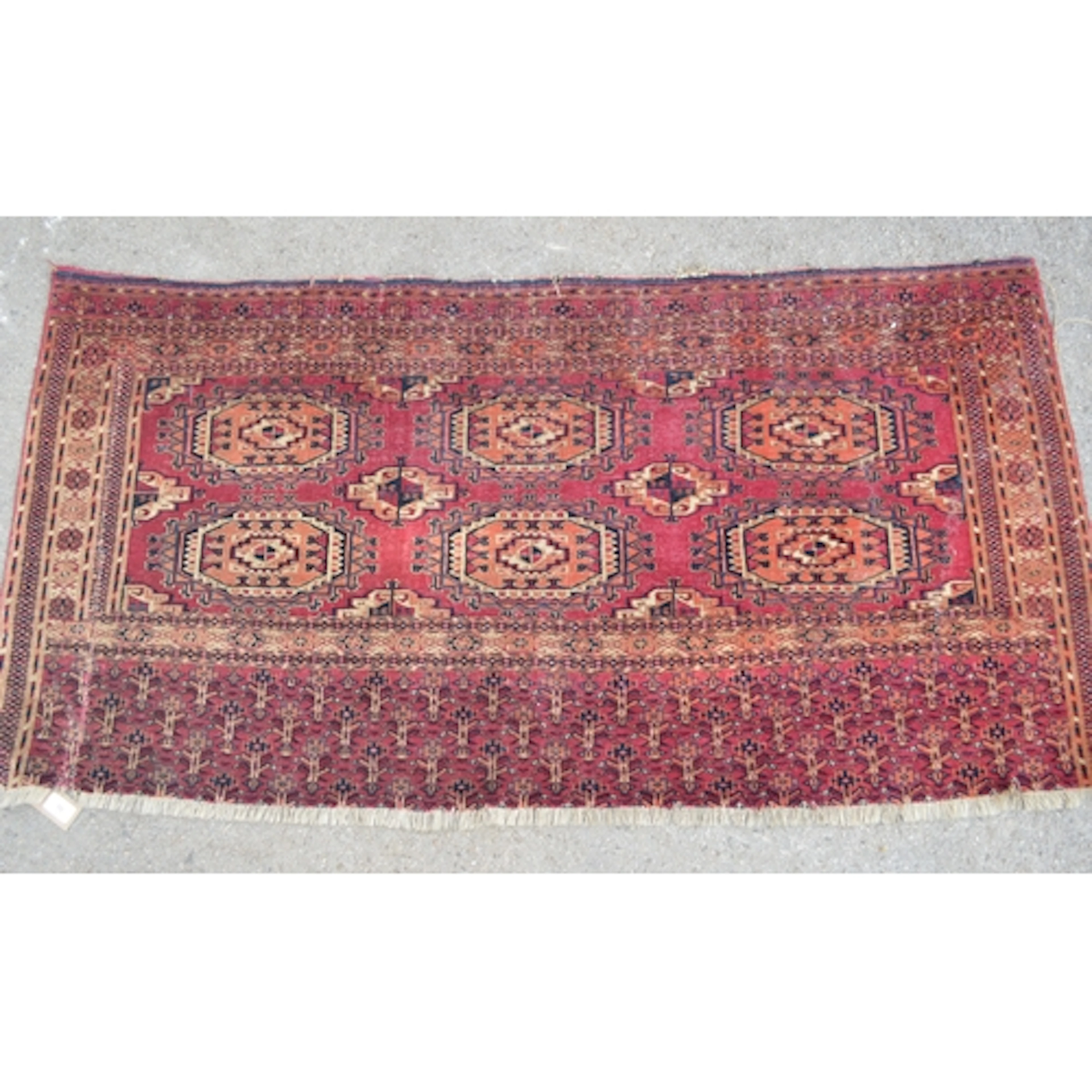 Turkoman tent bag with central hooked medallions and borders...