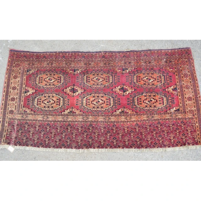 Turkoman tent bag with central hooked medallions and borders...